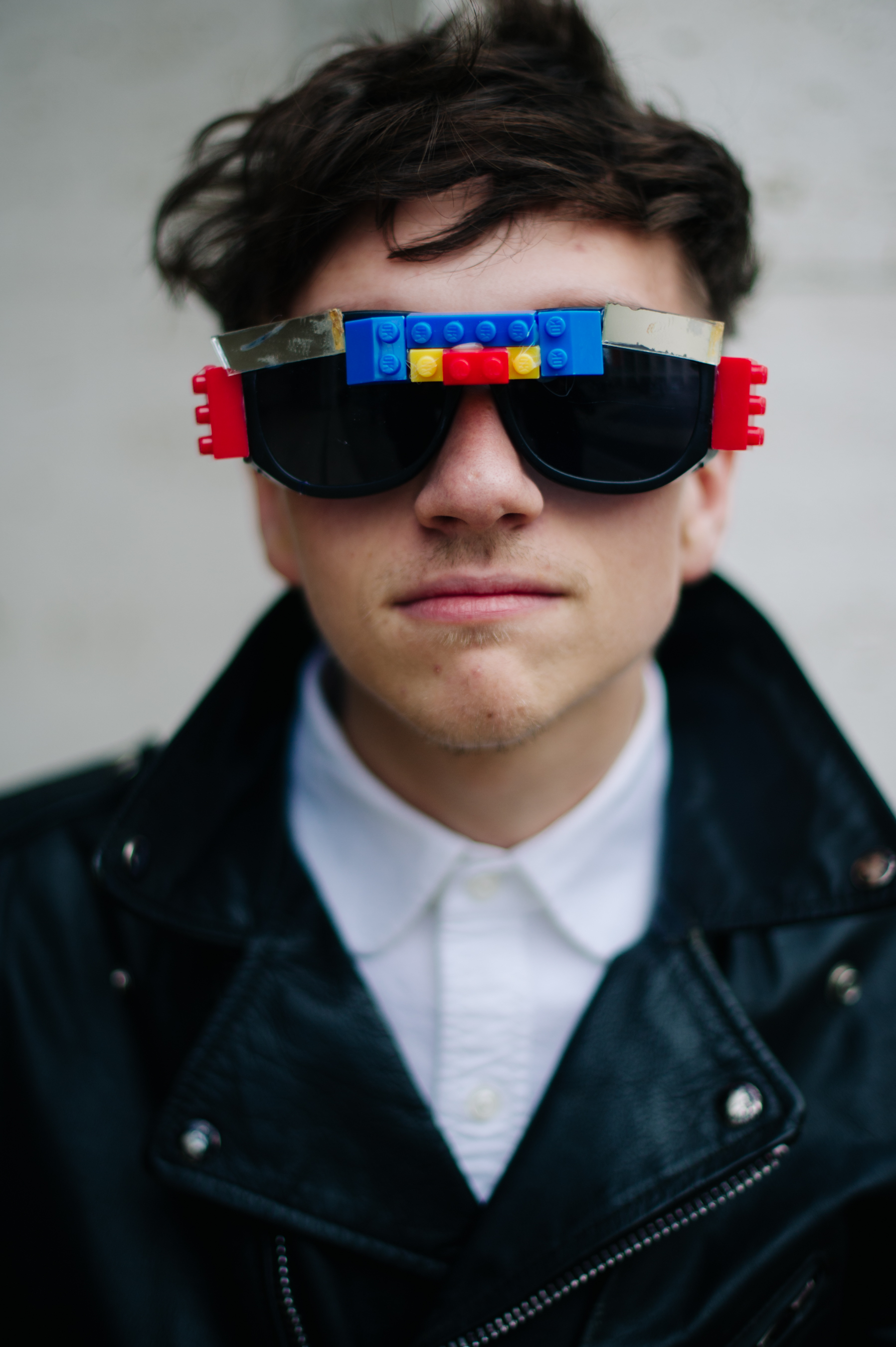 Portrait of a man wearing lego glasses