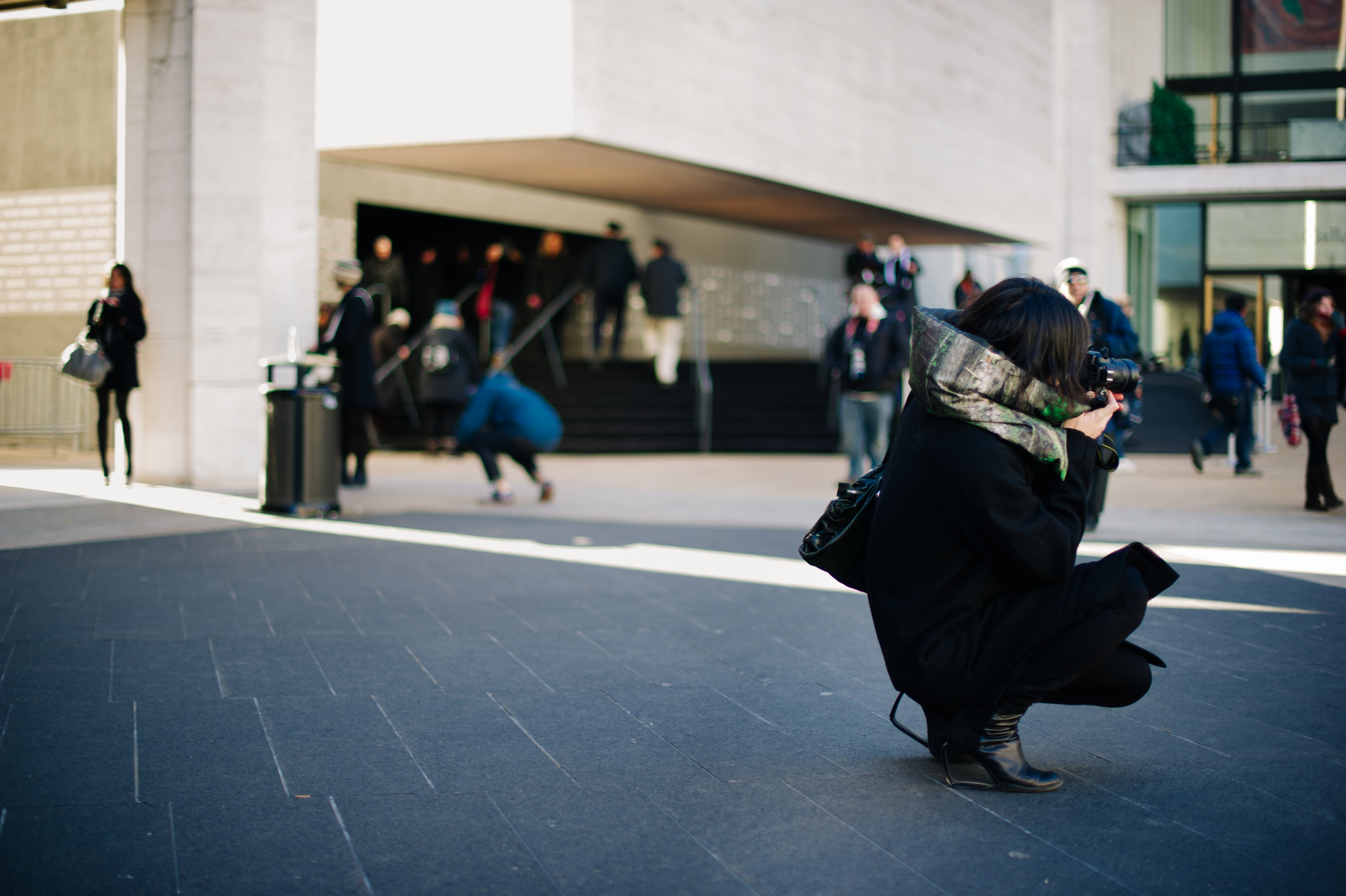 Man wearing coat and scarf