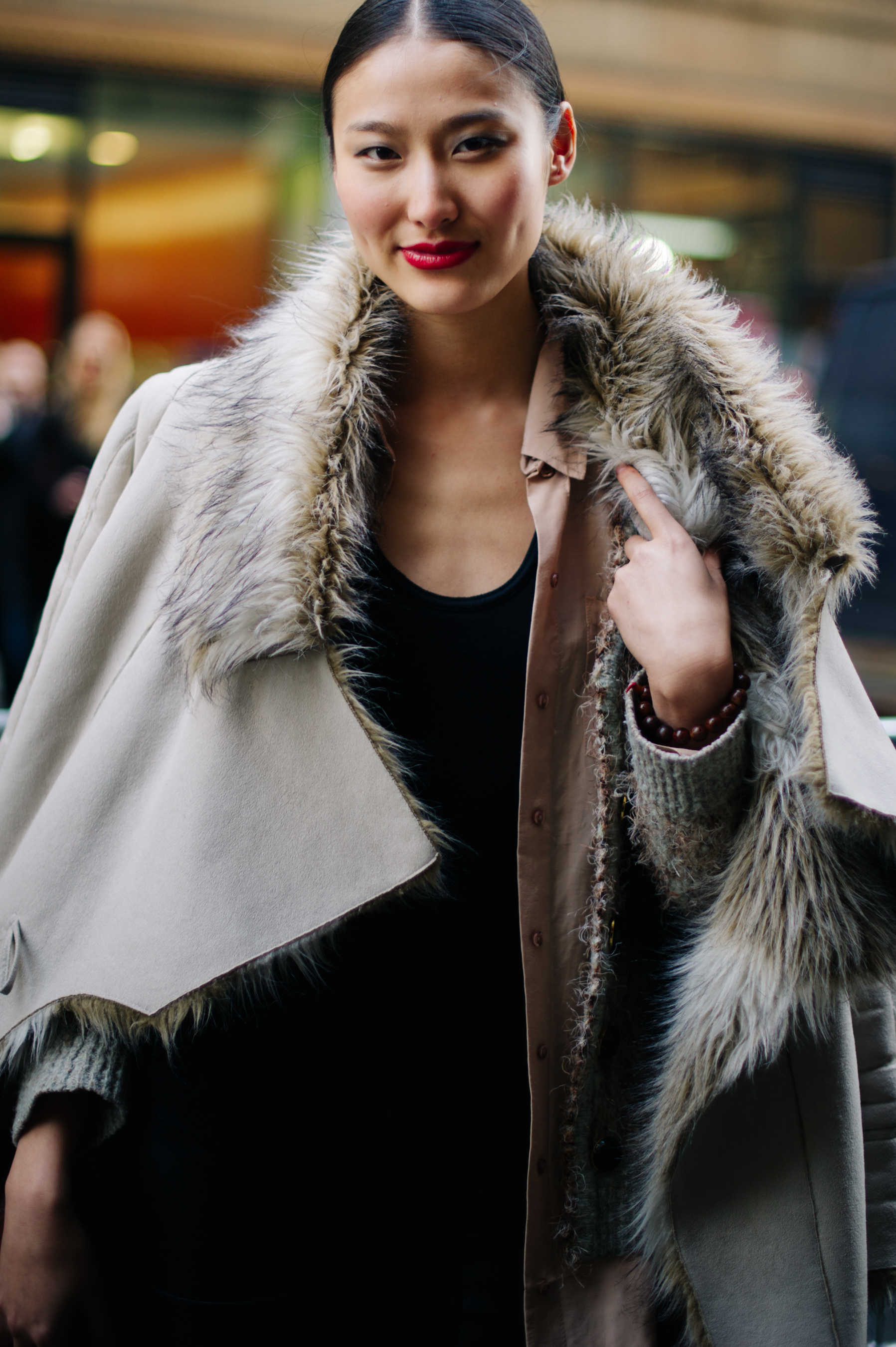 Woman wearing shearling coat