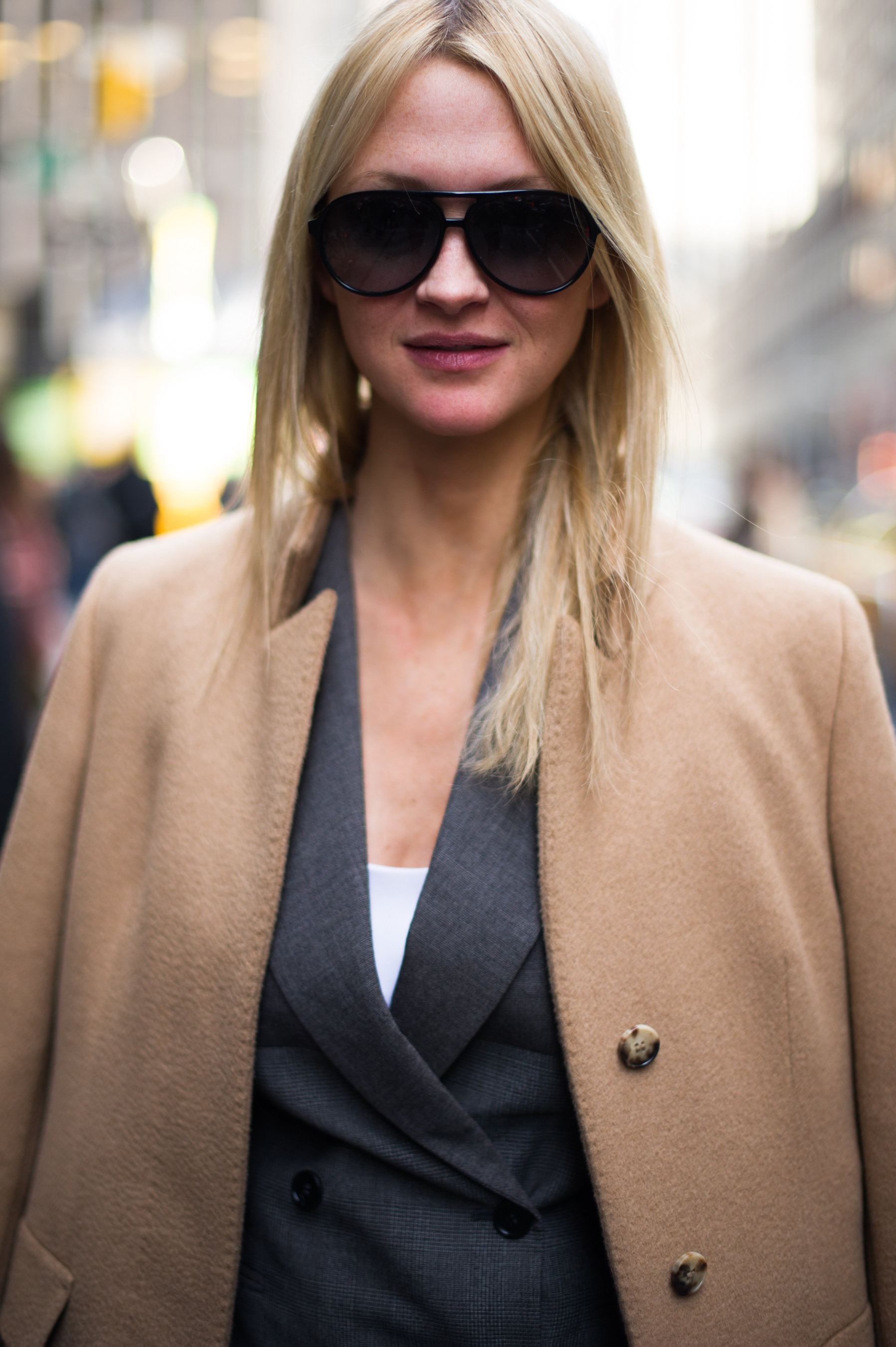 Woman wearing camel coat