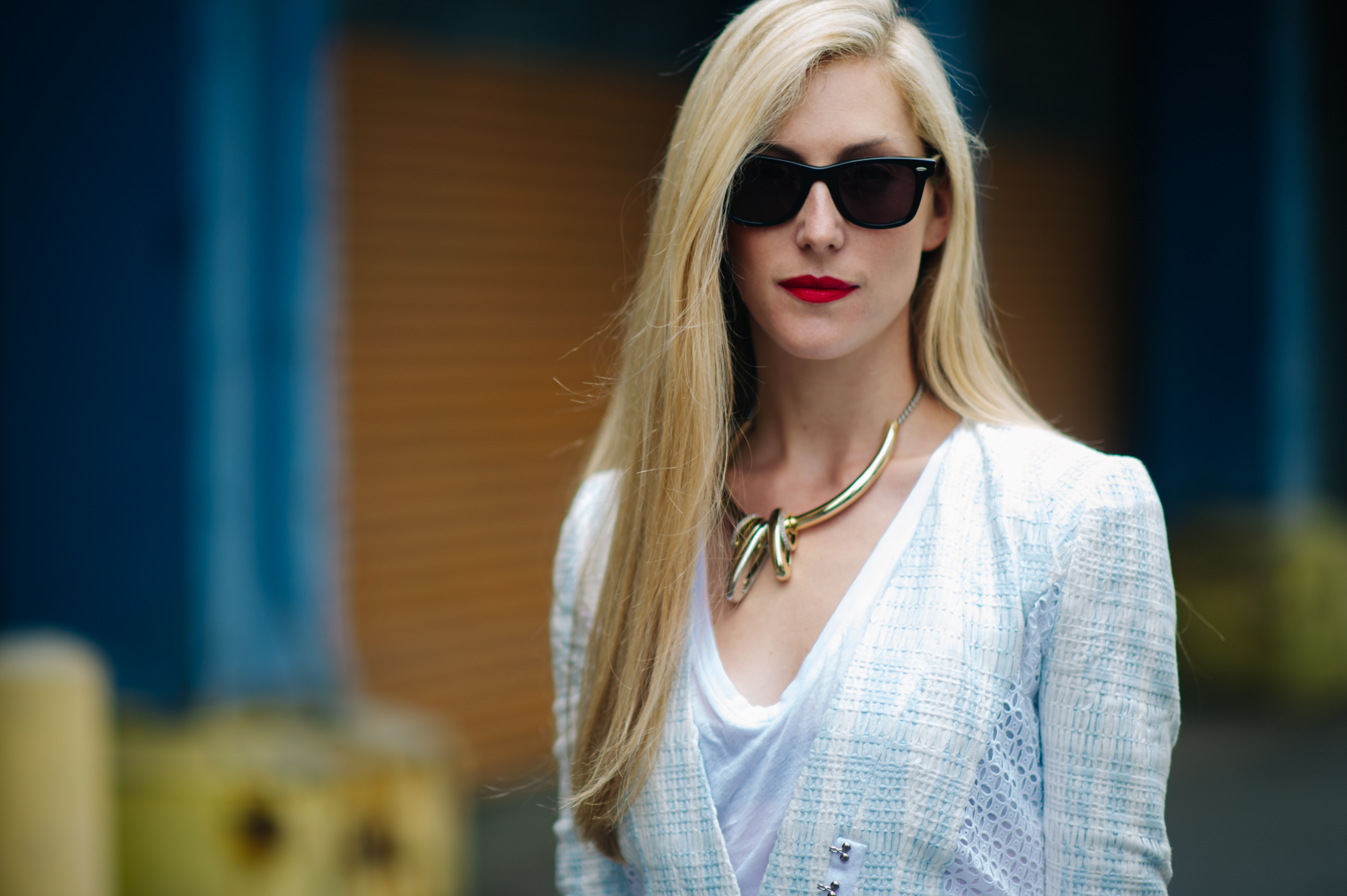 Woman wearing golden necklace