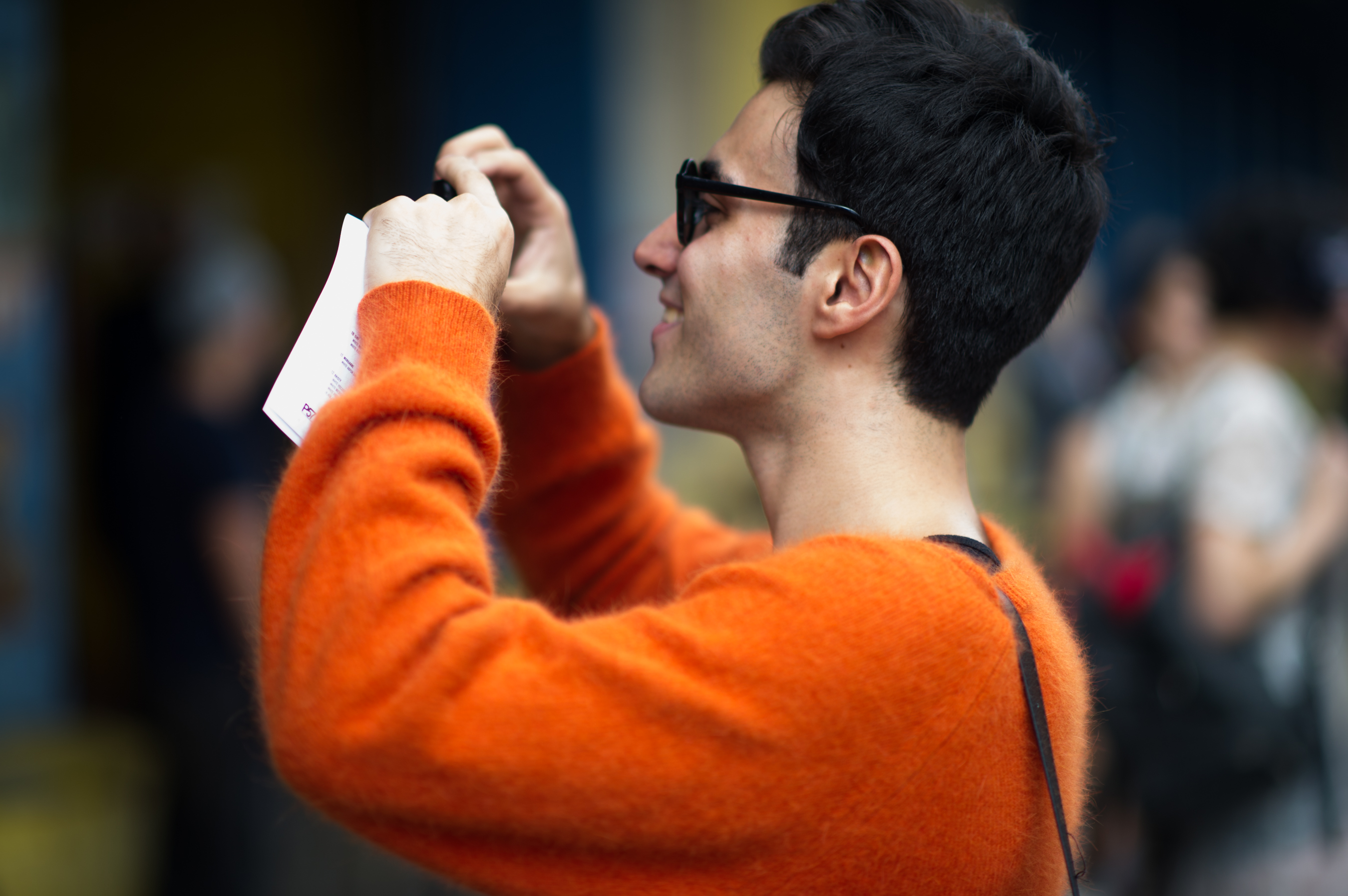 Man-Sunglasses-Orange-Taking-Photo