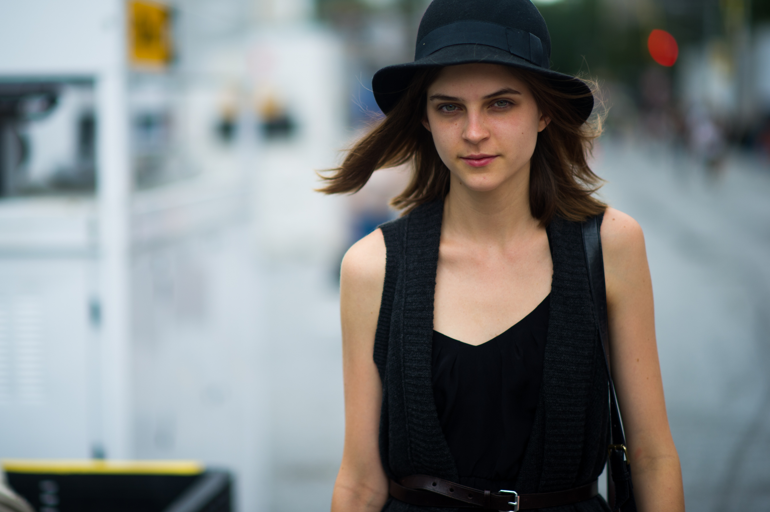 Model wearing black hat