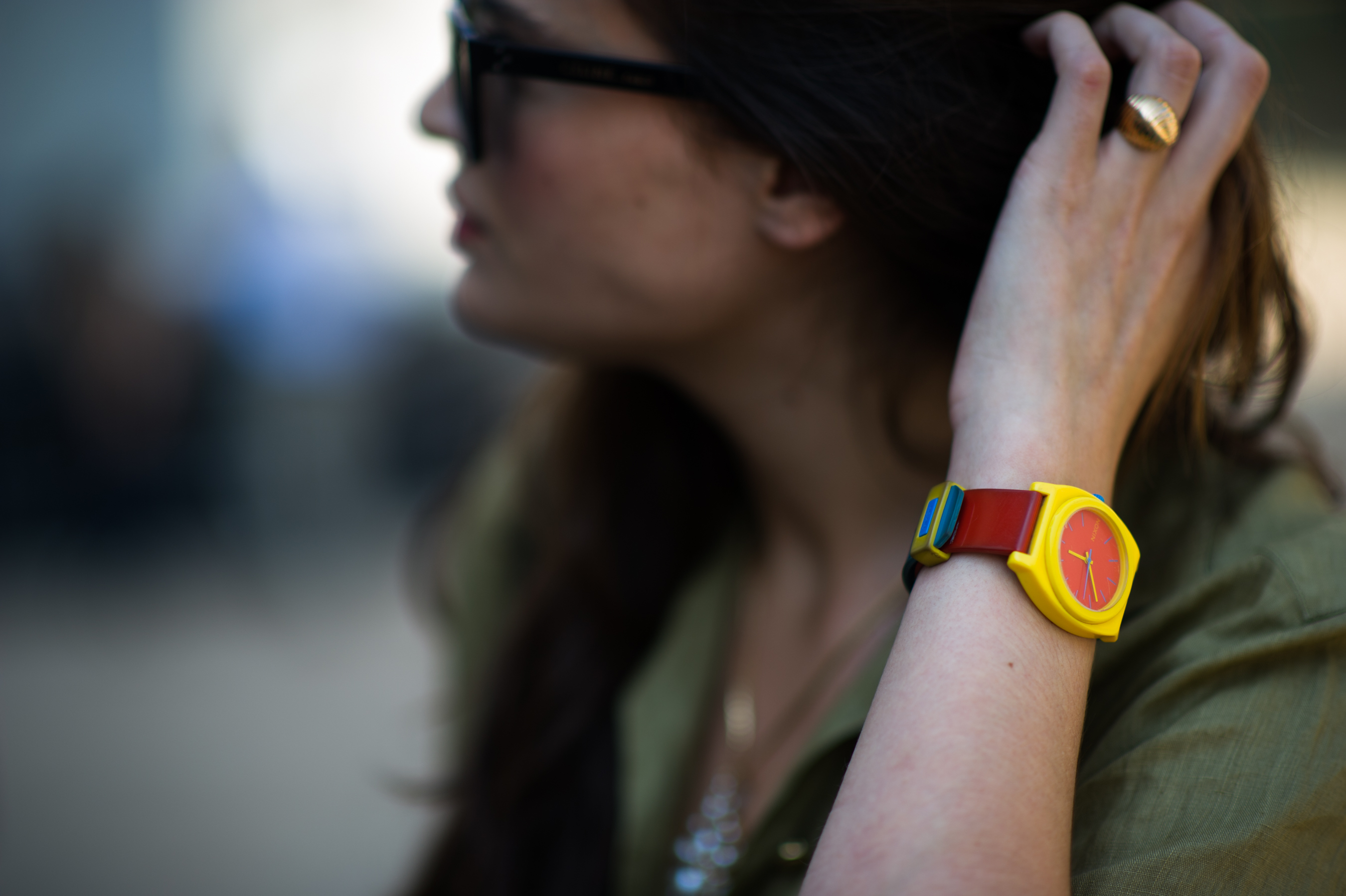 Woman wearing plastic watch