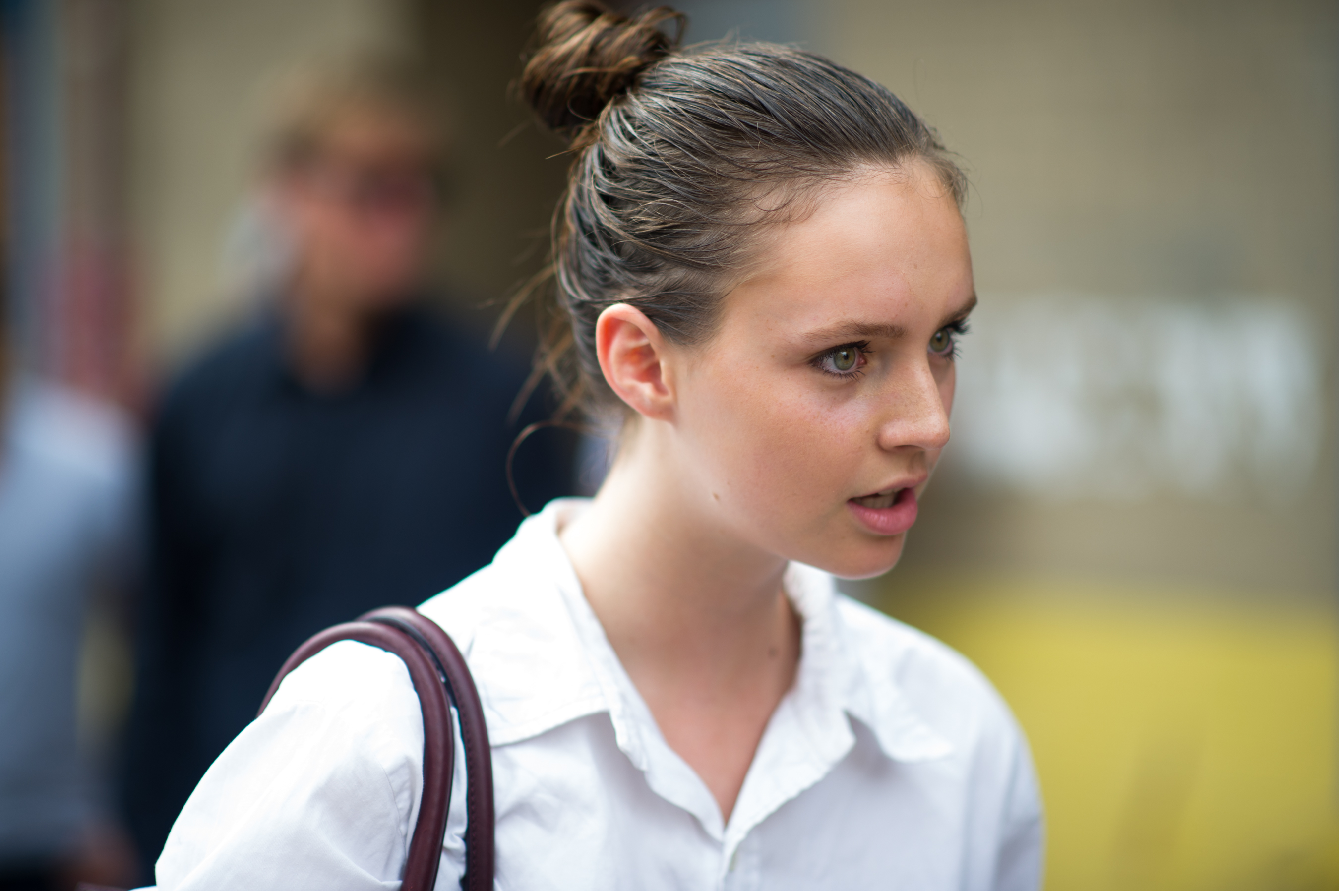 Model wearing white shirt