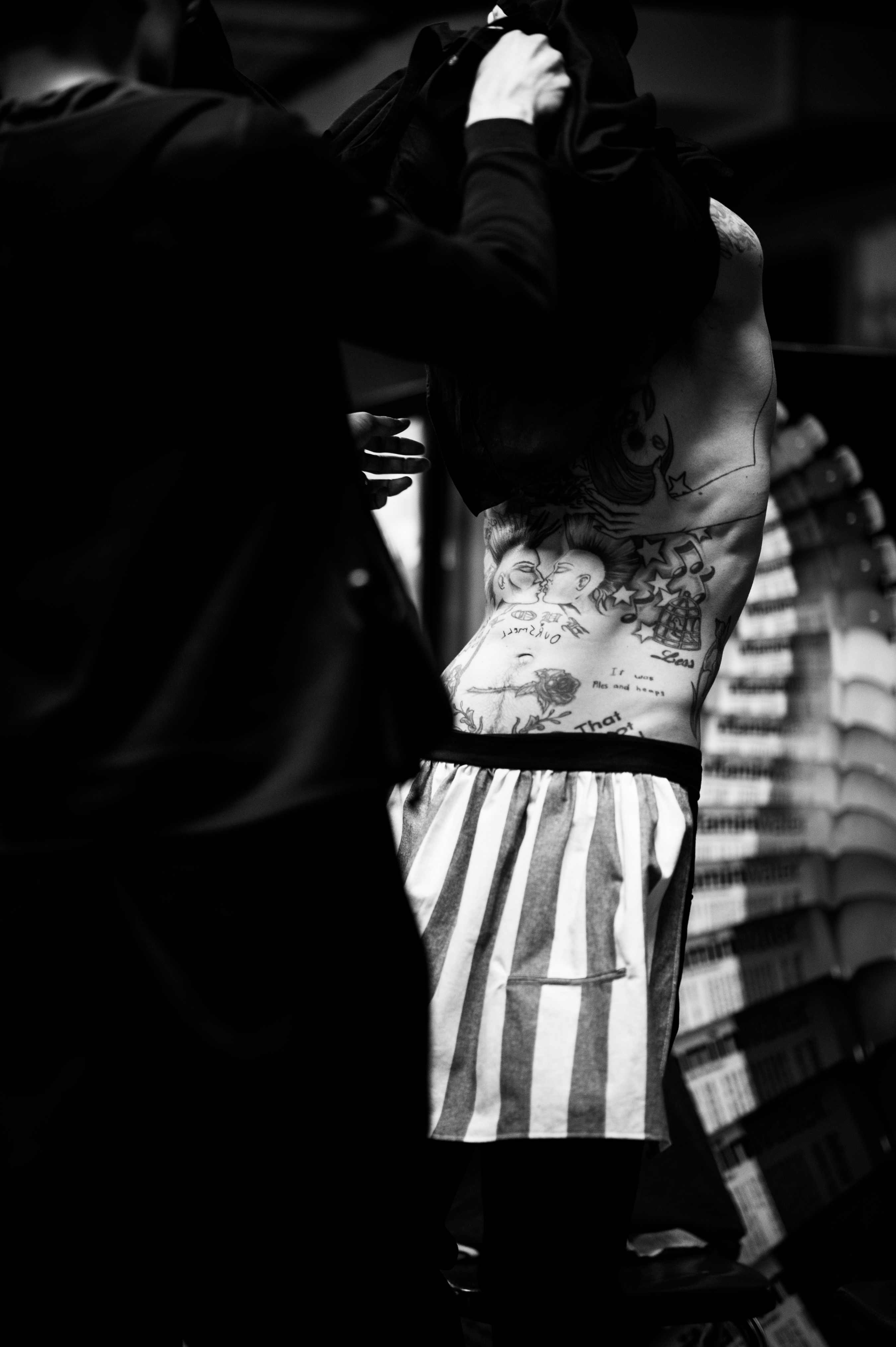 Male model getting dressed