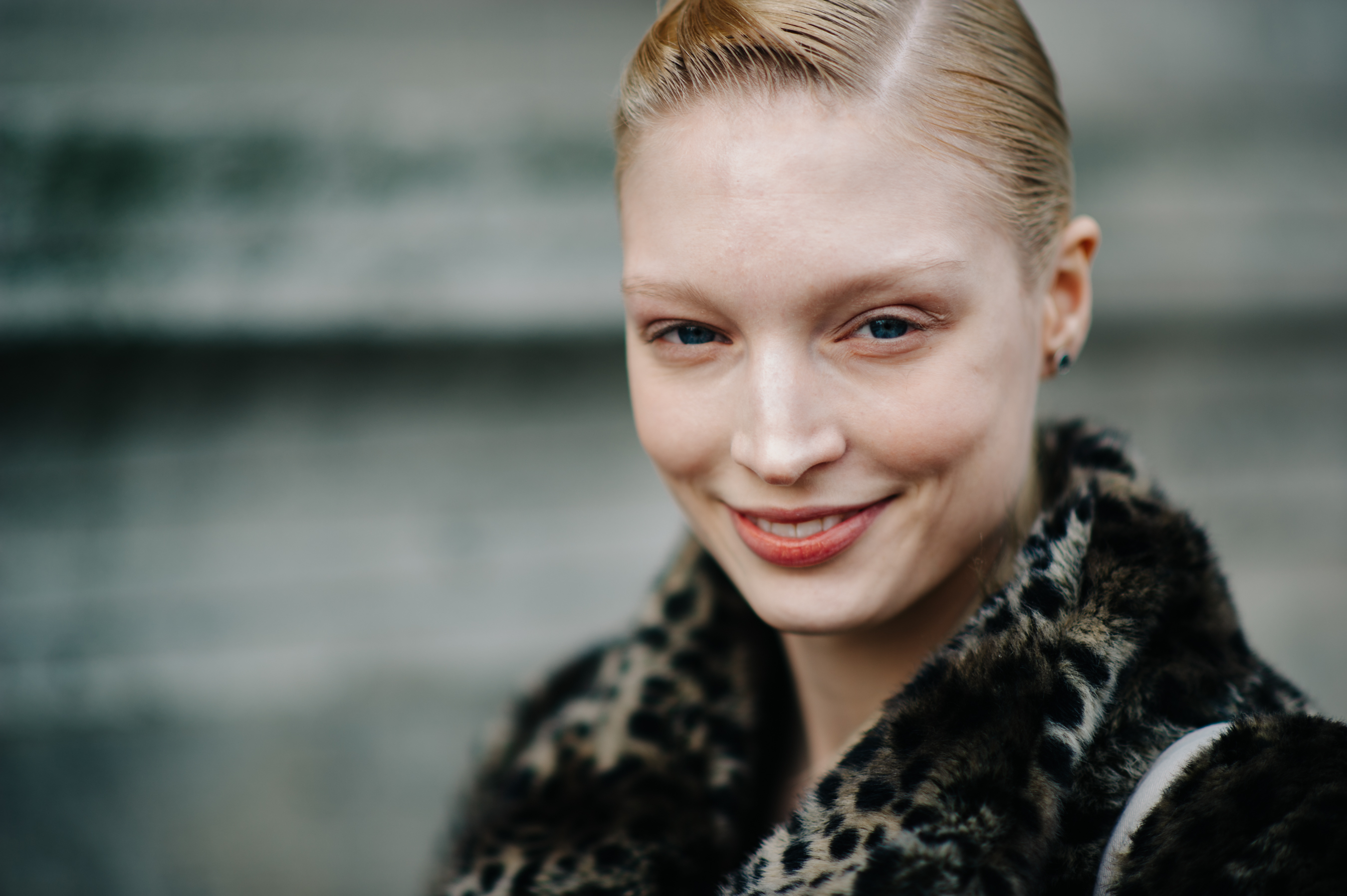 Portrait of a blonde model laughing
