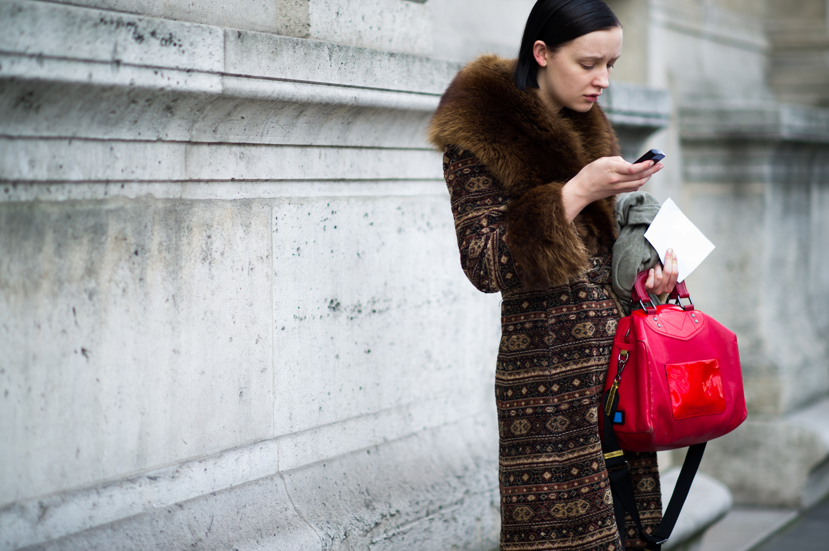 Woman with large red bag