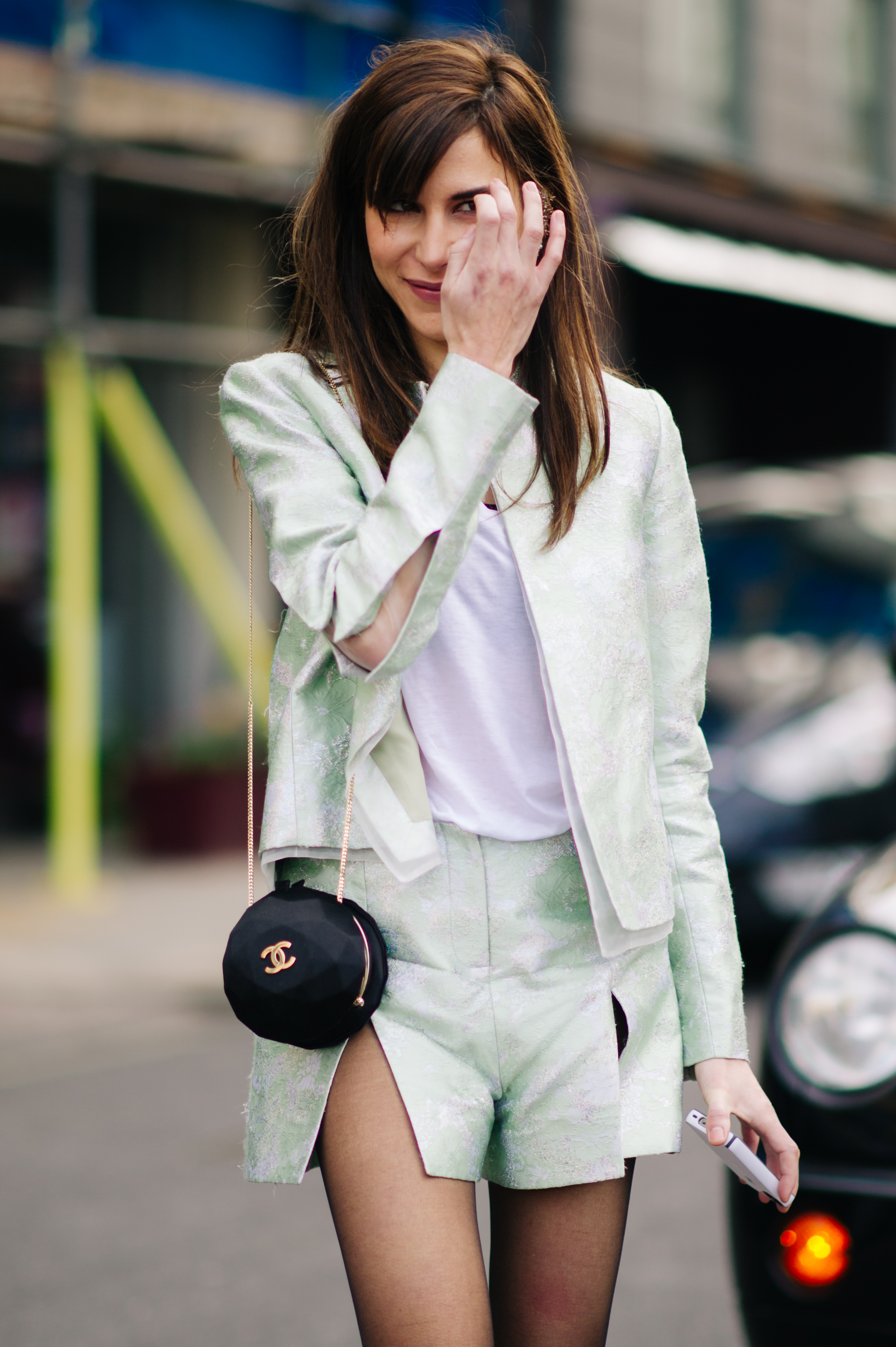 Woman wearing mint colour suit