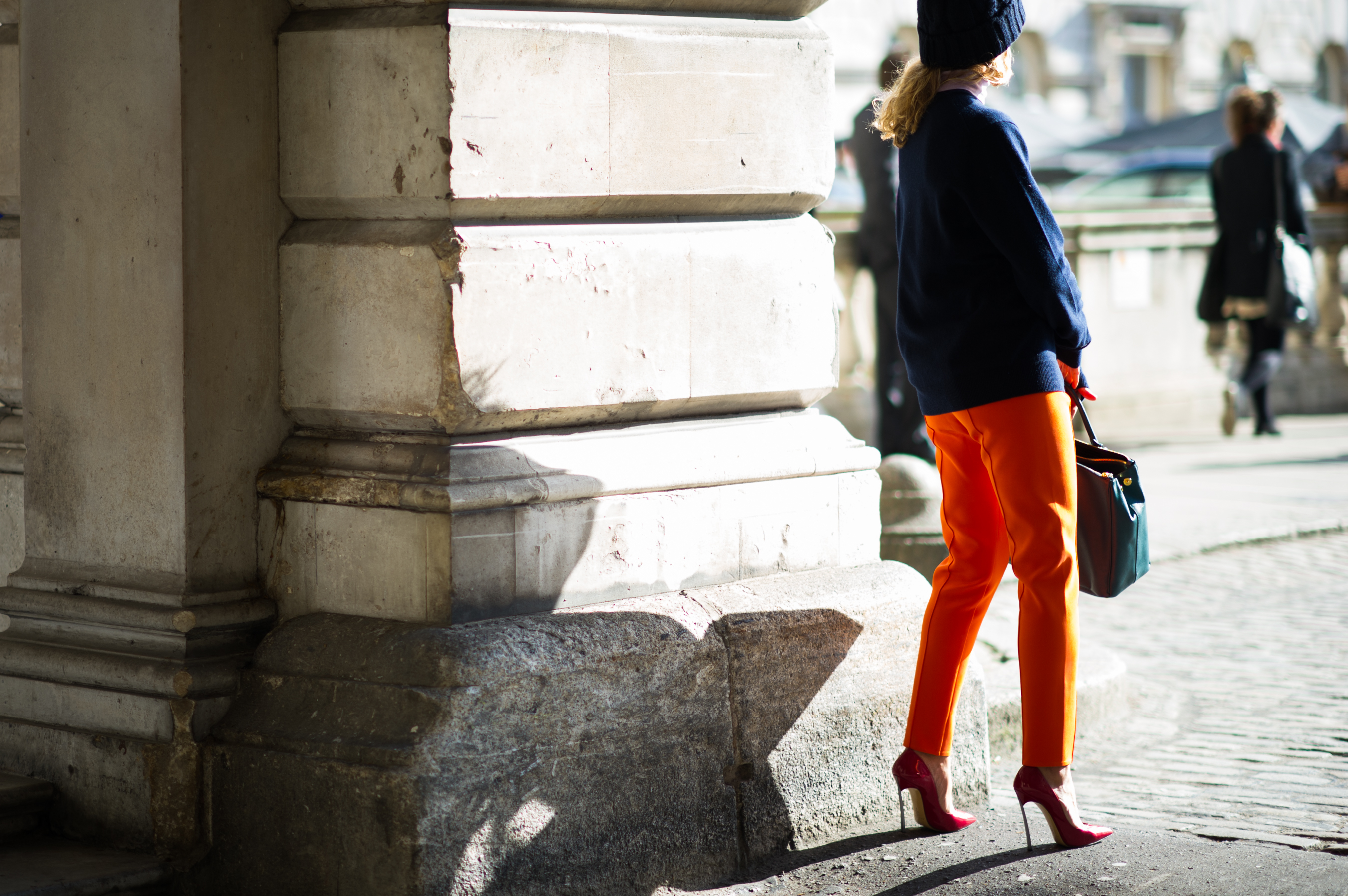 Blogger wearing bright orange pants