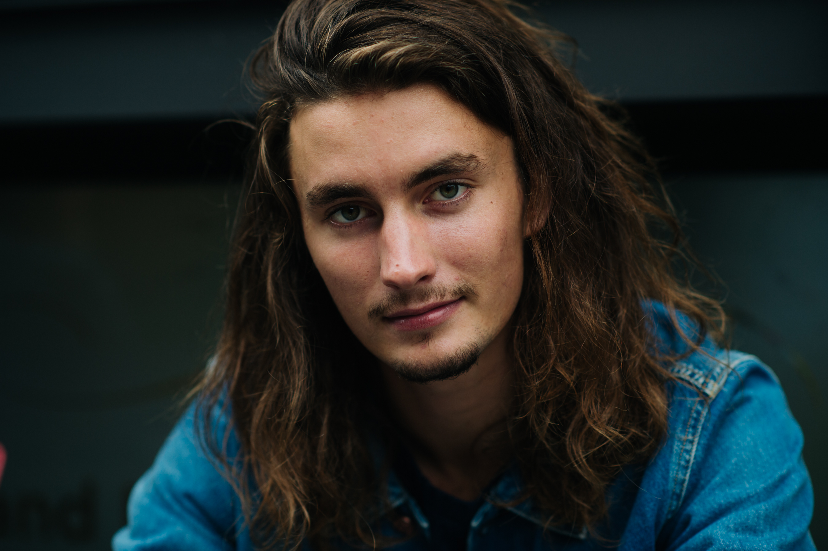 Long-Hair-Guy-Stoop-Sitting