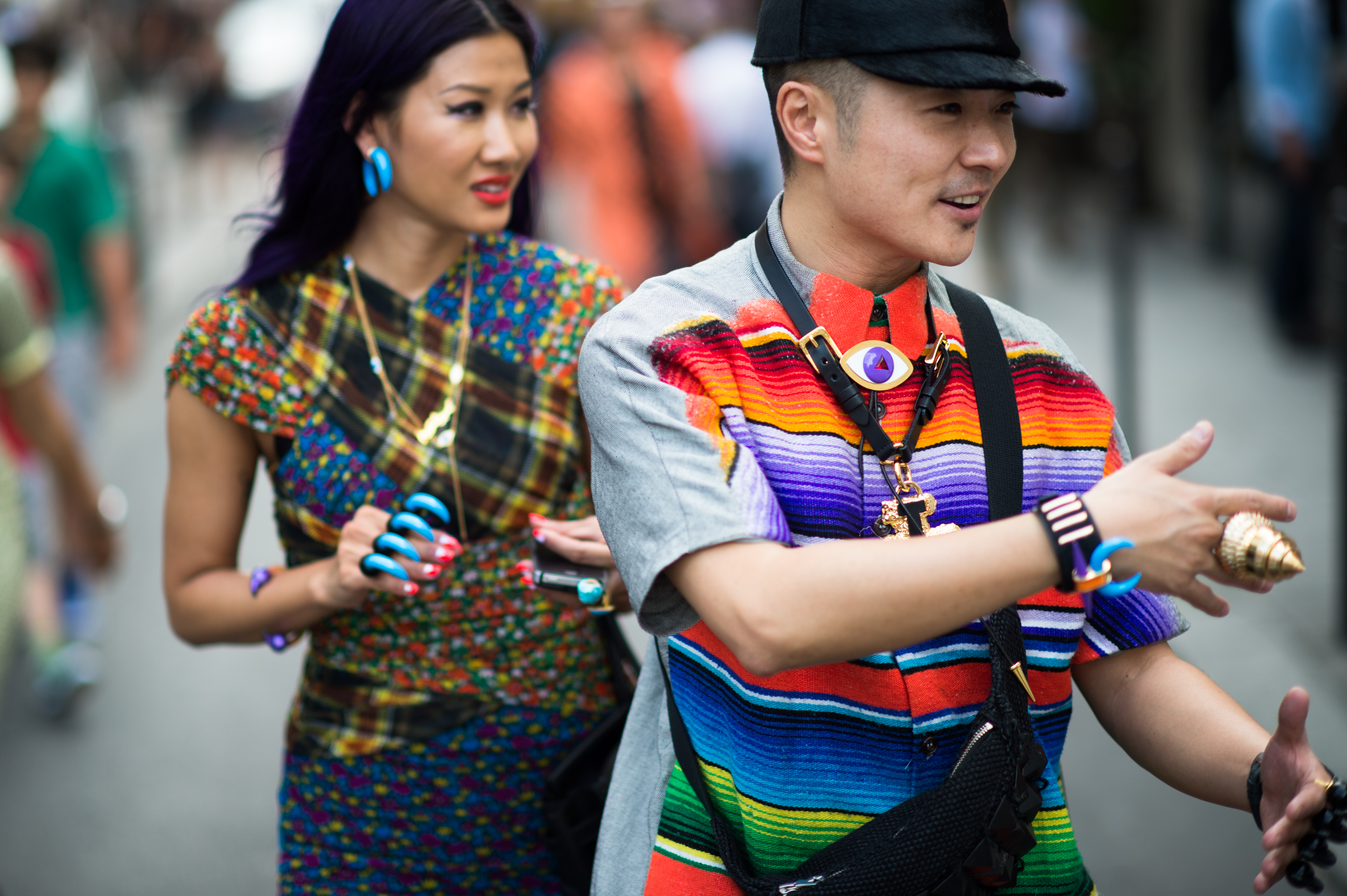 Man and woman wearing colourful clothes