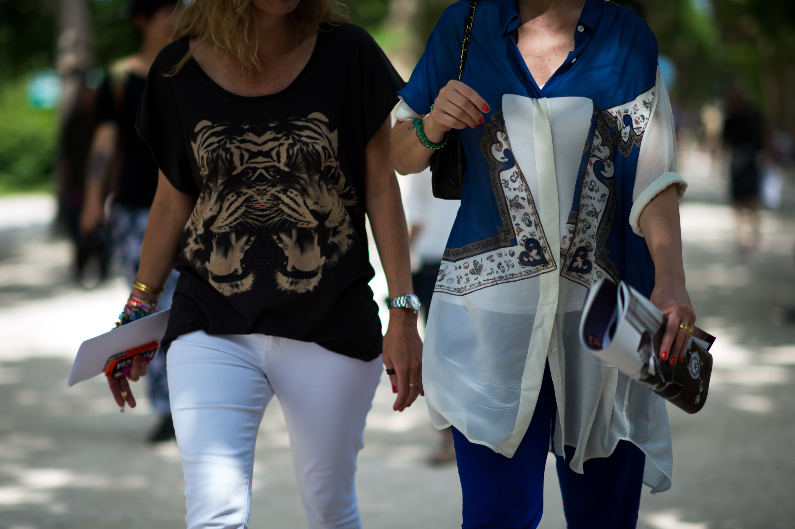Two-Women-Wearing-Graphic-Shirts