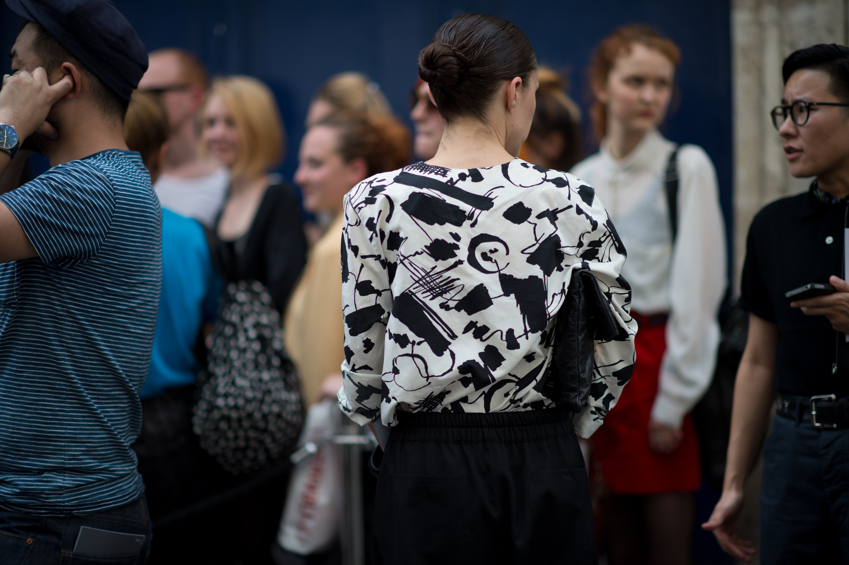 Woman wearing graphic blouse