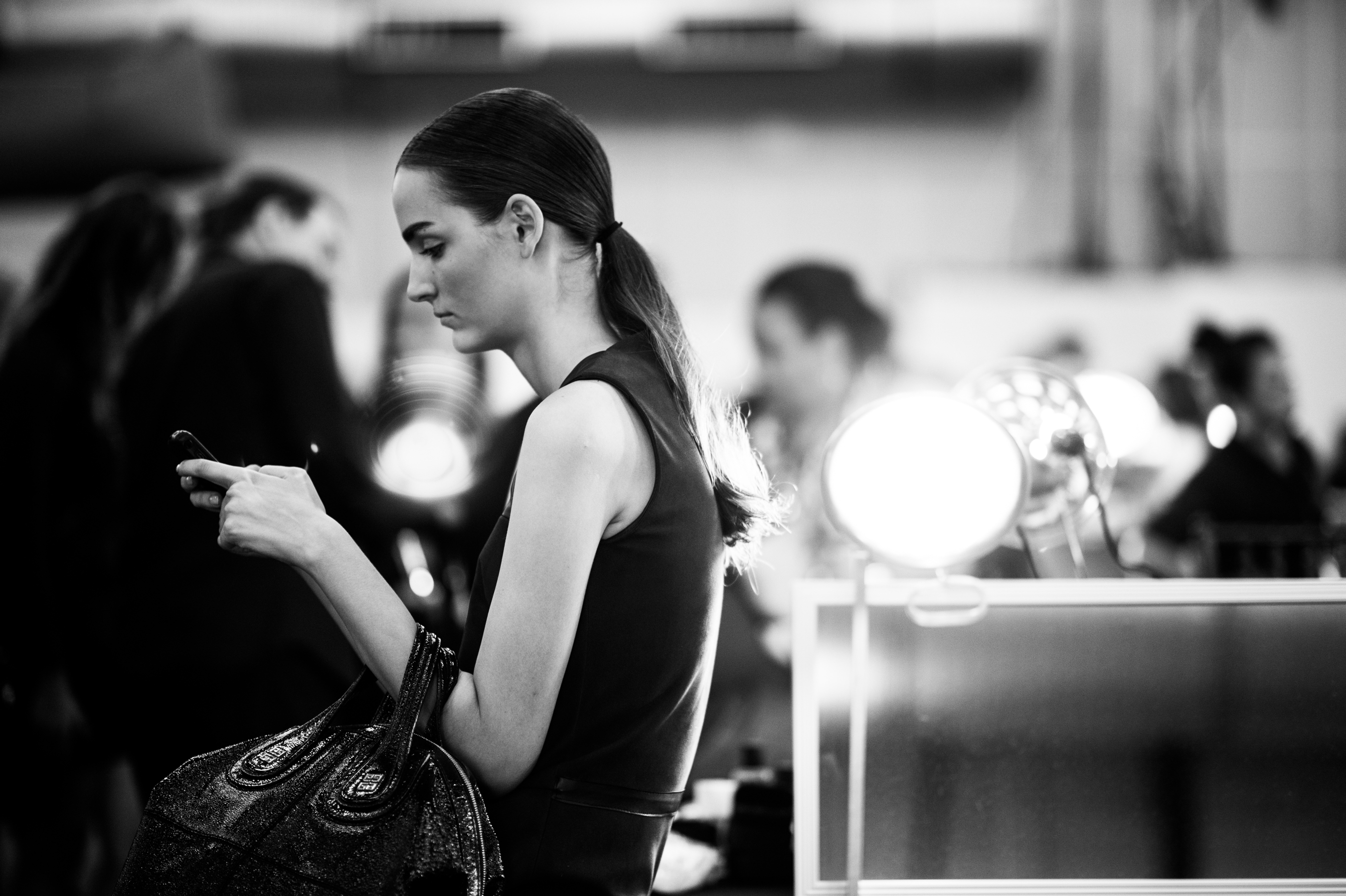 Model-Texting-Backstage-Before-Show