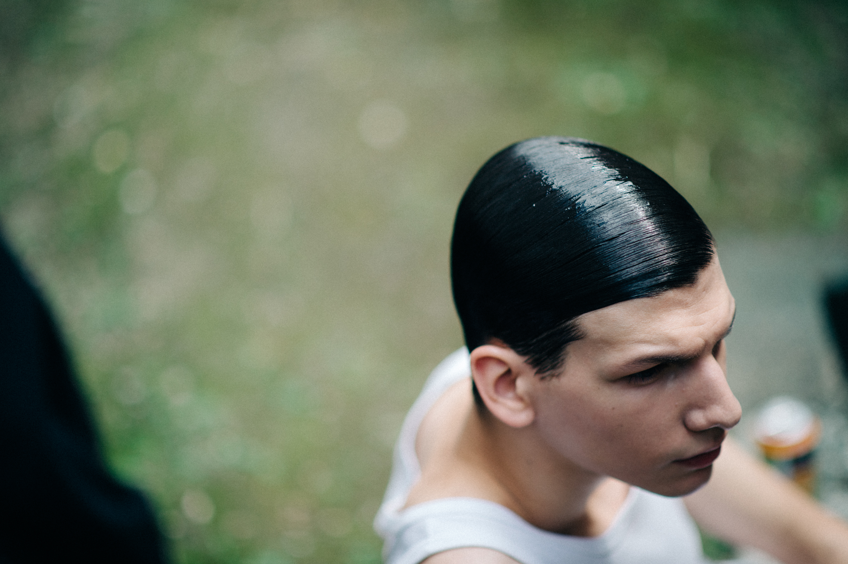 Male-Model-Slicked-Hair-Backstage