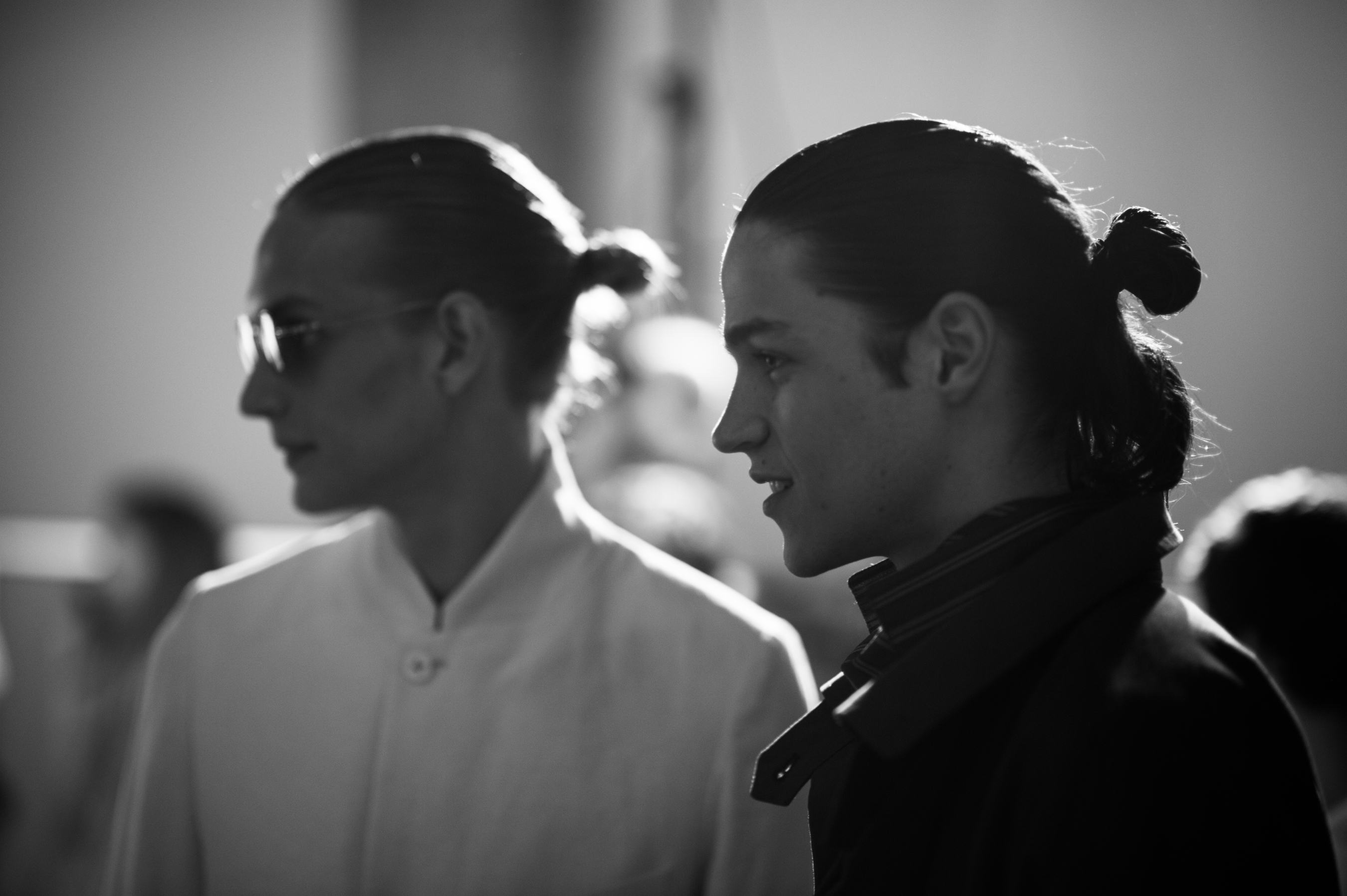 Two male models with long hair