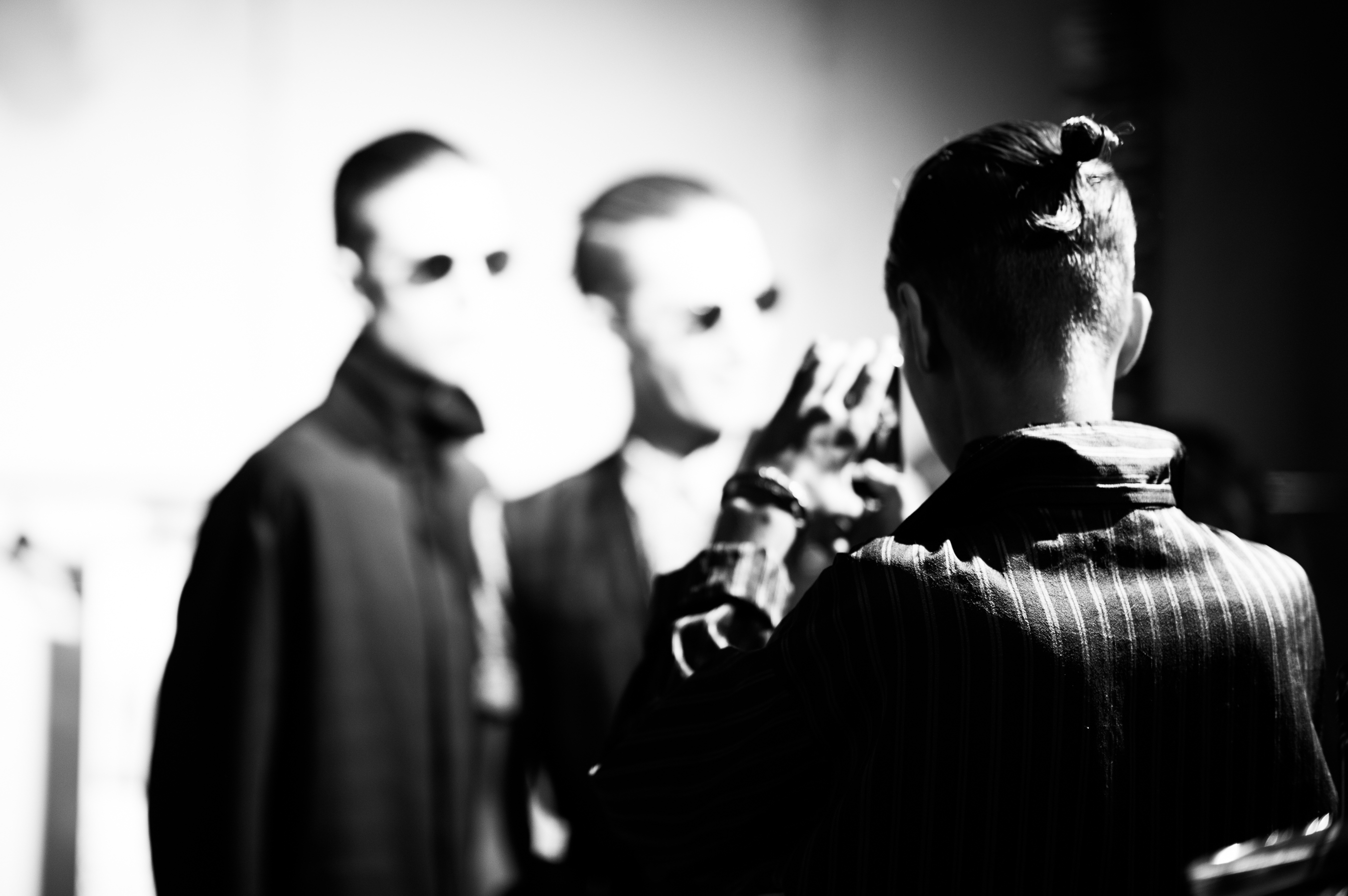 Three male models before the show