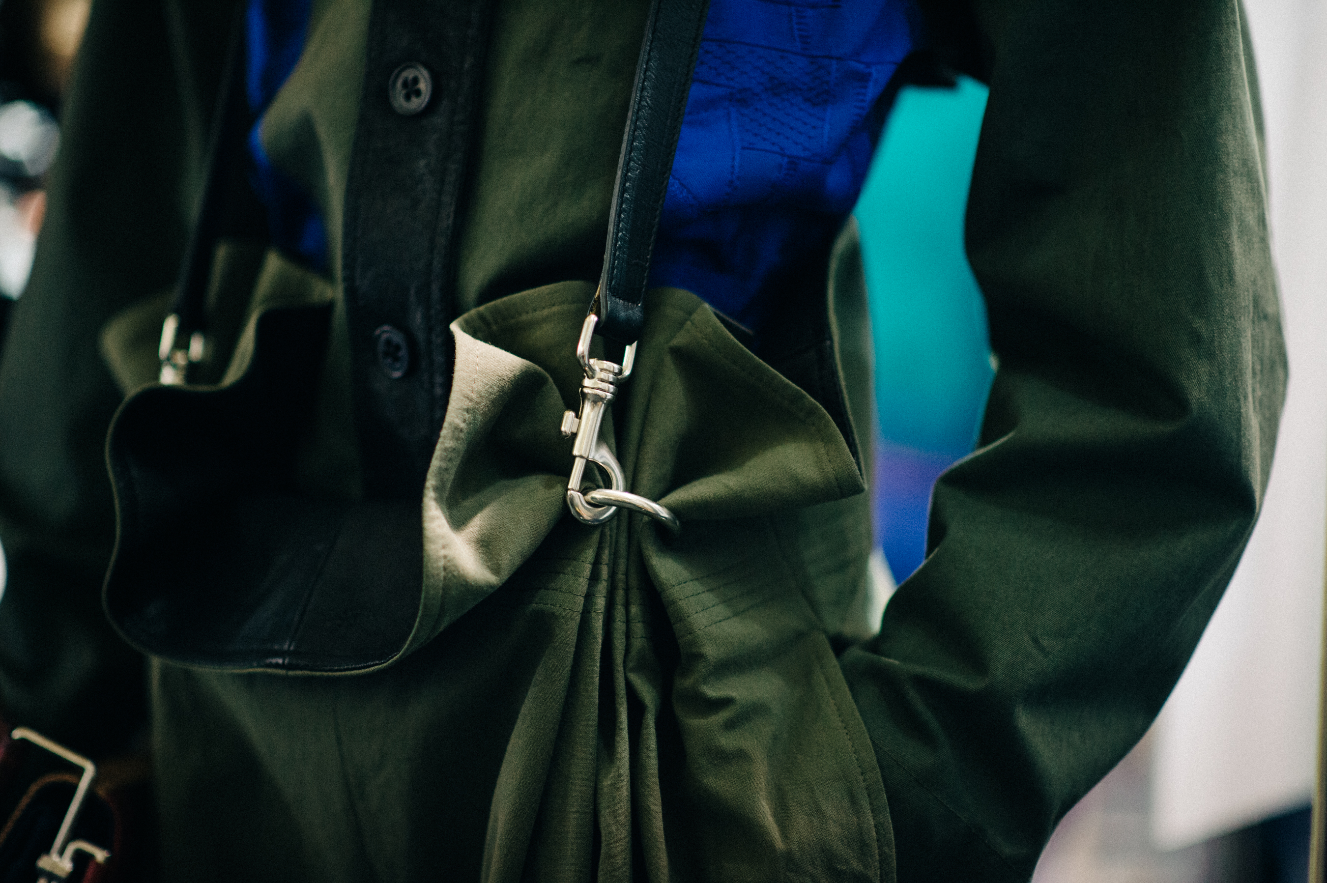 Model wearing green pants before the show