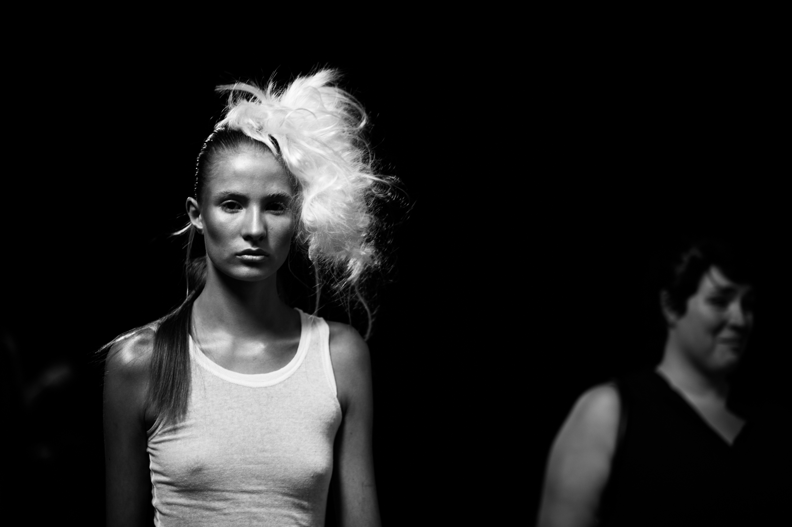 Model with white hair before the show