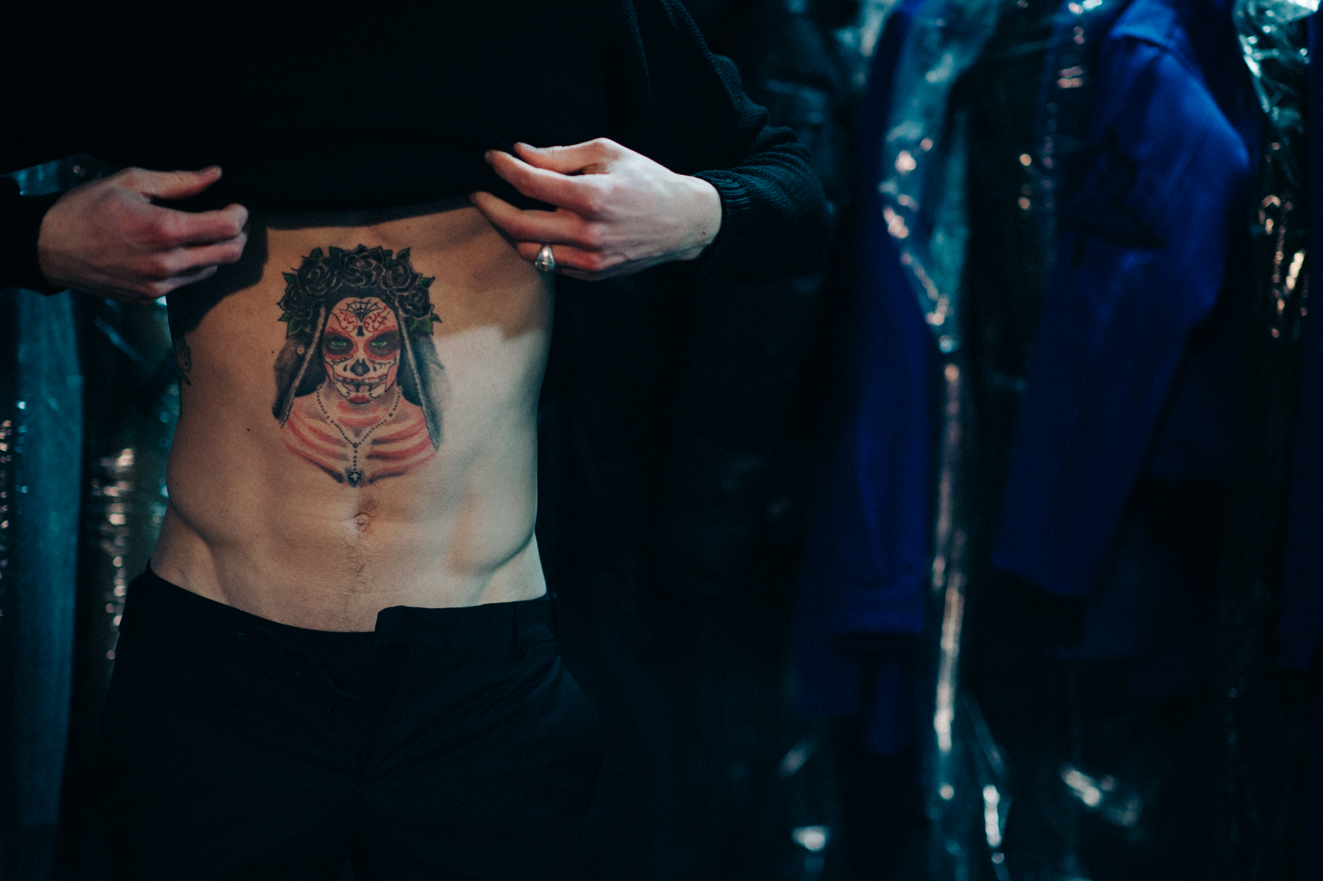 Male-Model-Stomach-Tattoo-Backstage