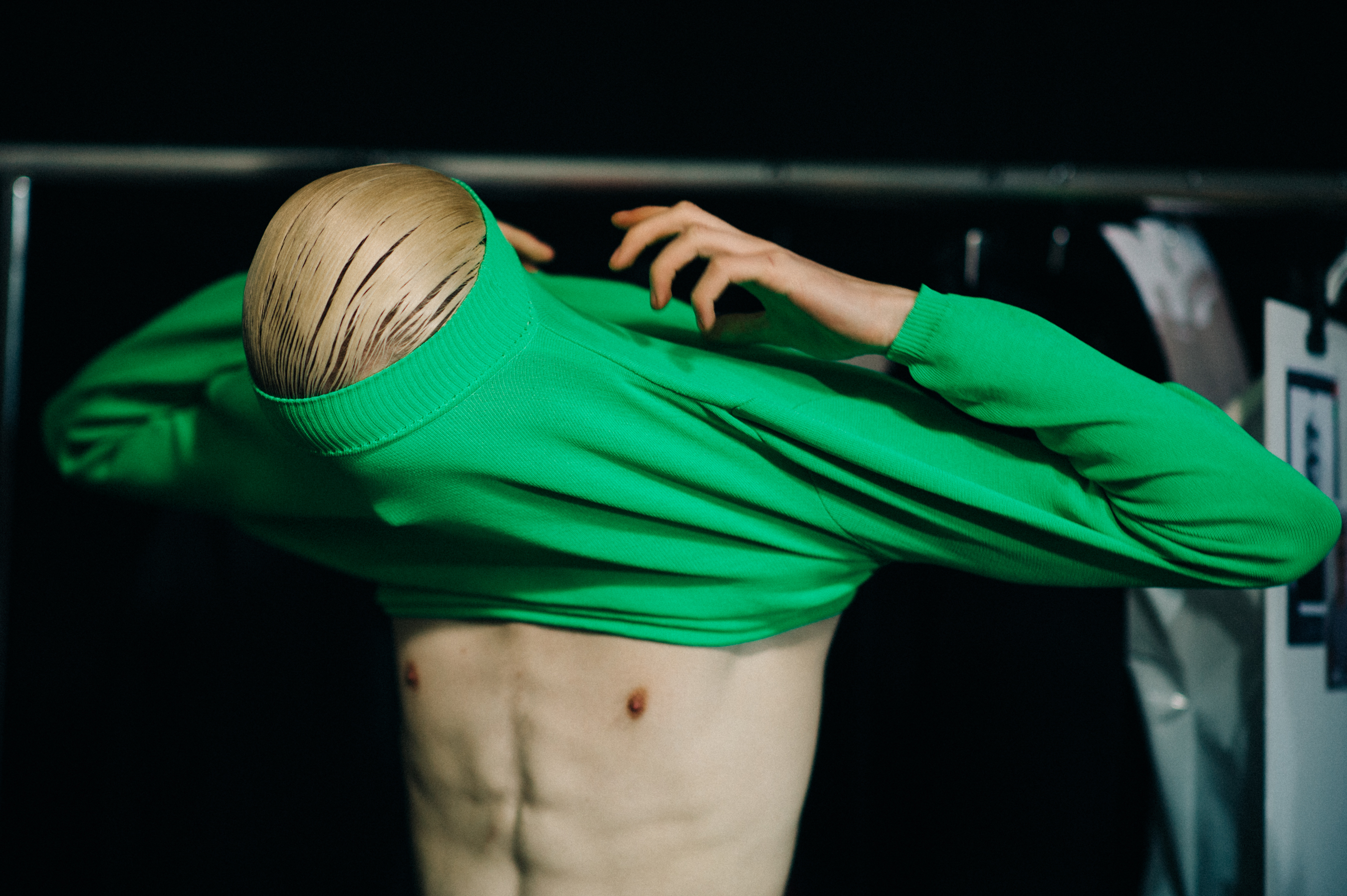 Benjamin-Jarvis-Putting-On-Shirt