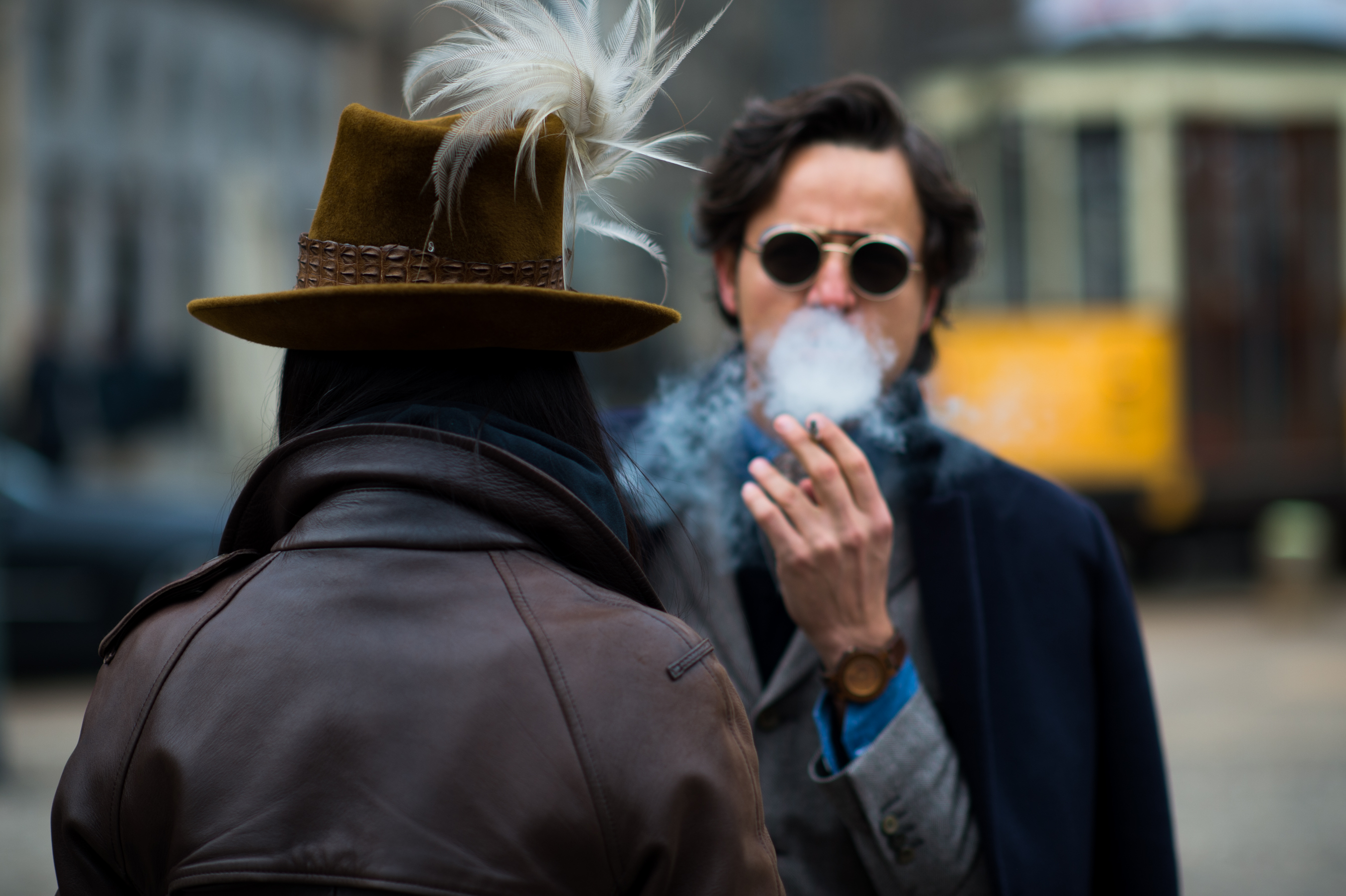 Man-Smoking-Feather-Hat-Sunglasses