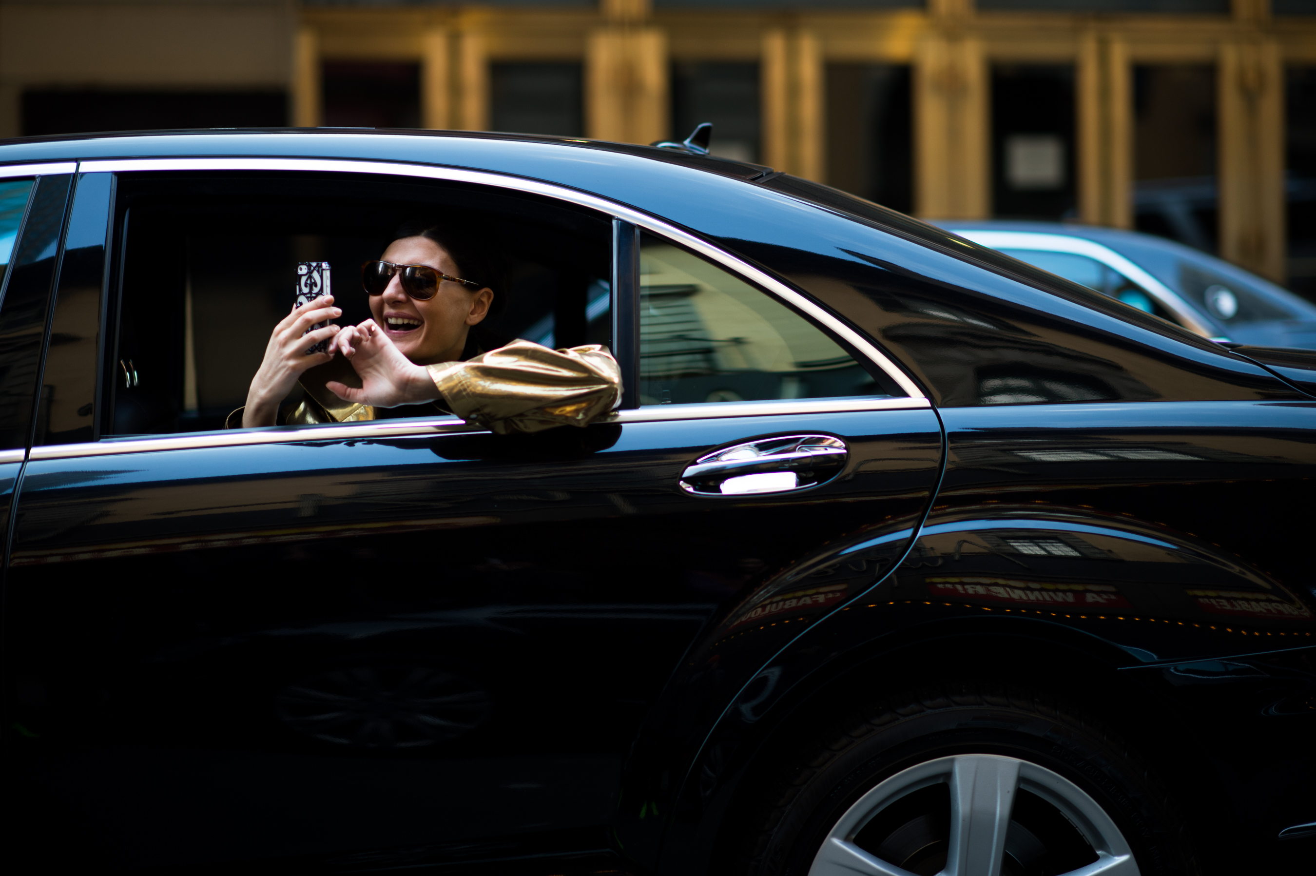 Stylist-Sunglasses-Taking-iPhone-Photo