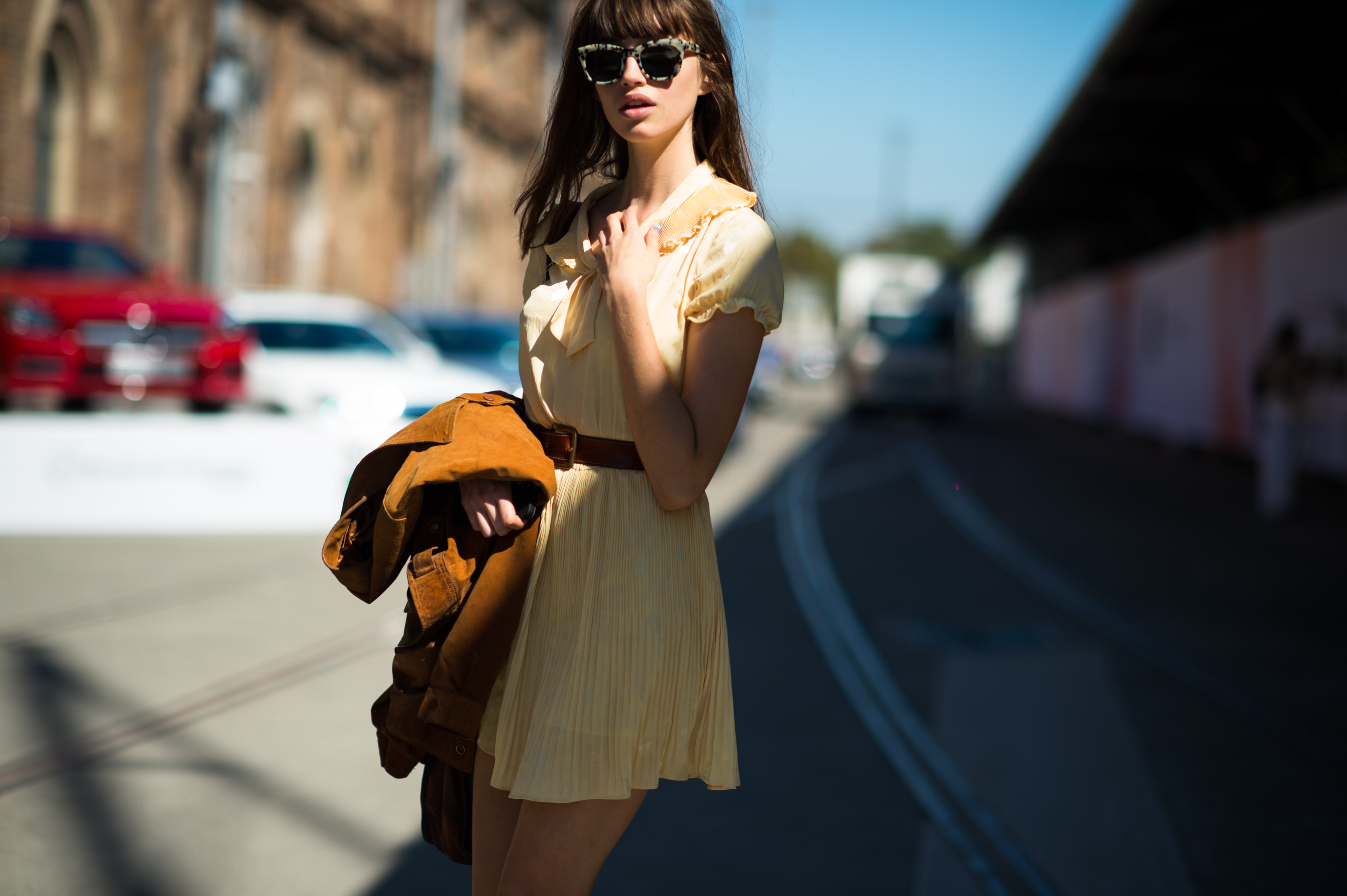 Australian Model wearing Sunglasses Yellow Dress