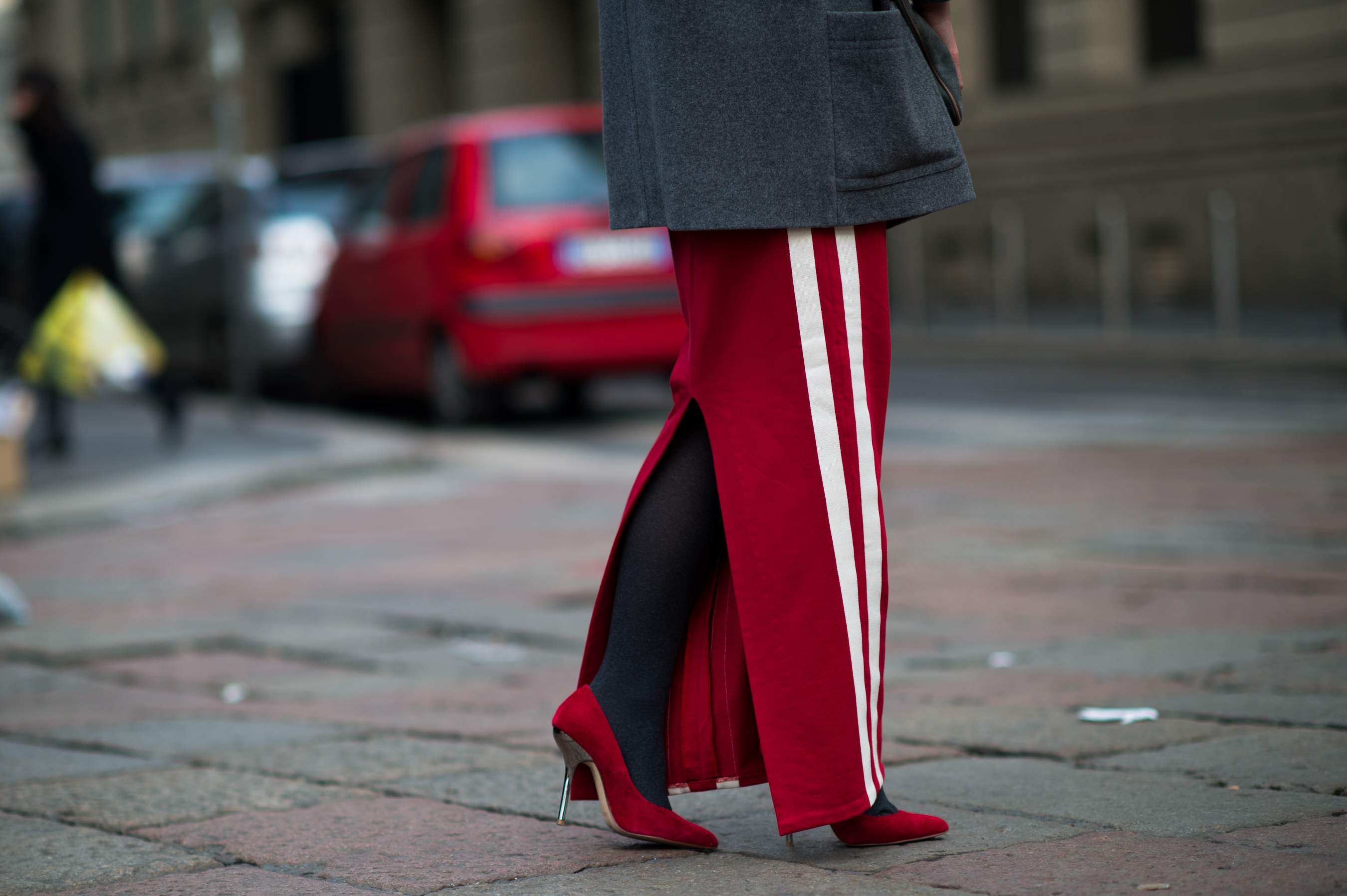 Woman wearing red heels and skirt