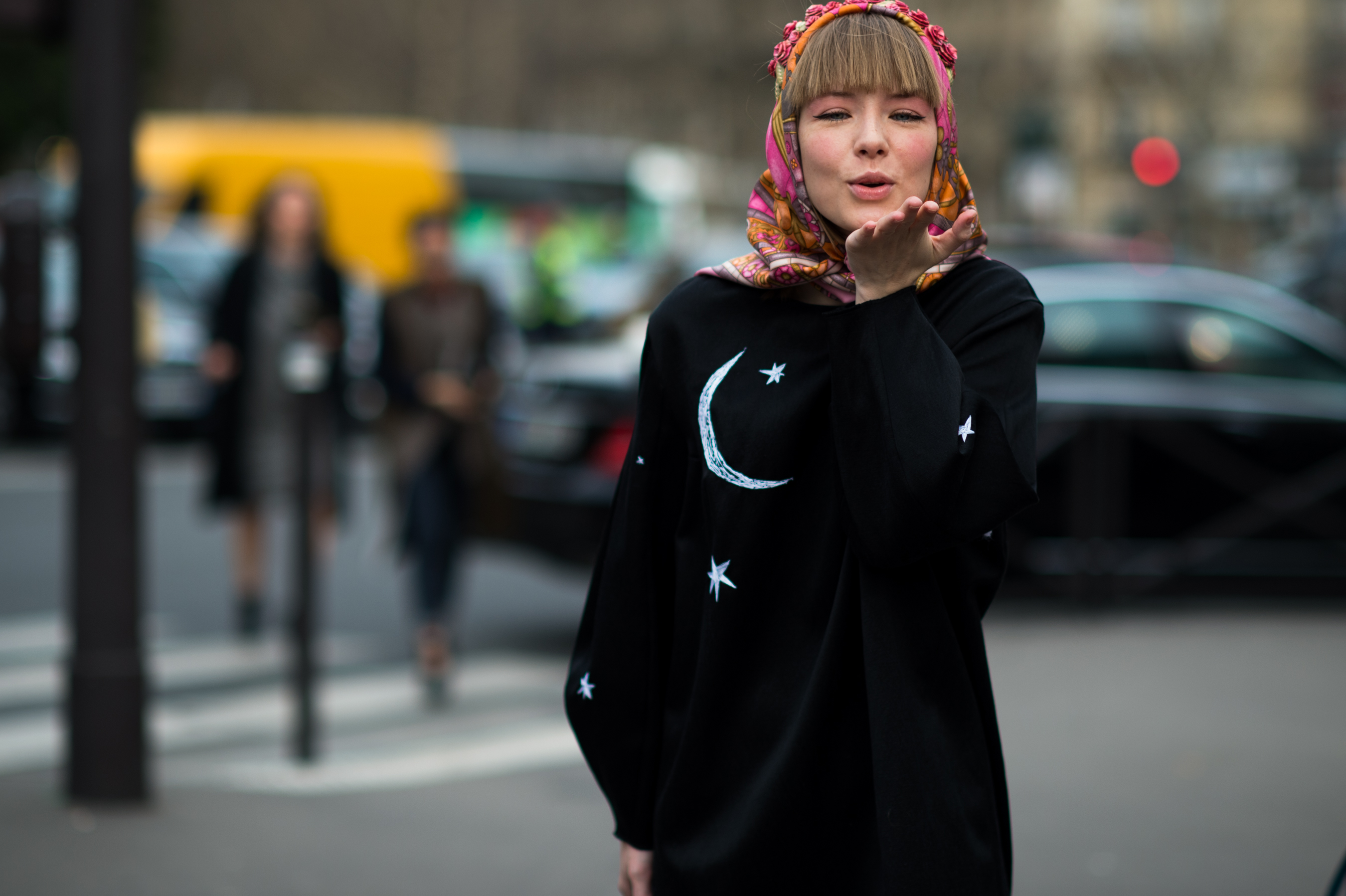 Russian designer wearing kissing camera