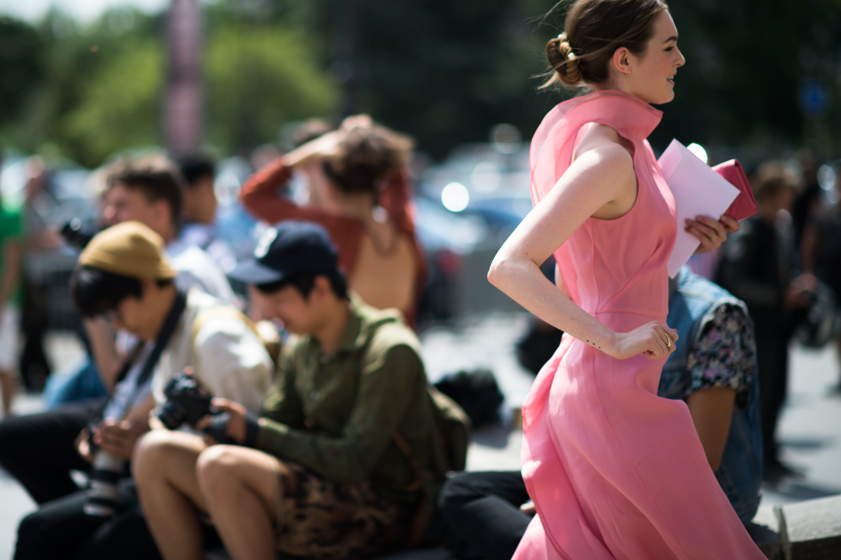 Model wearing pink silk jumpsuit