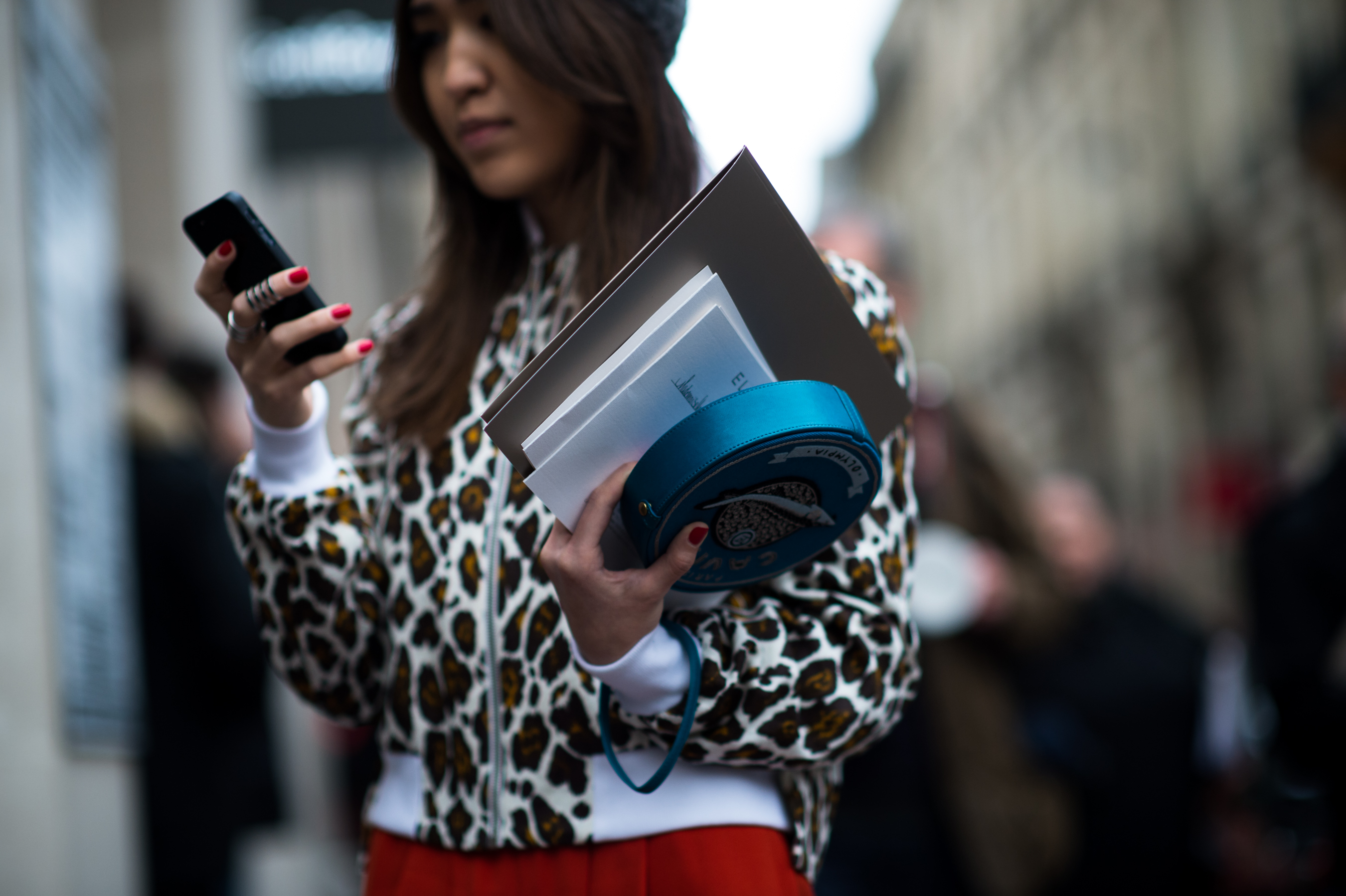 Woman holding caviar shaped bag