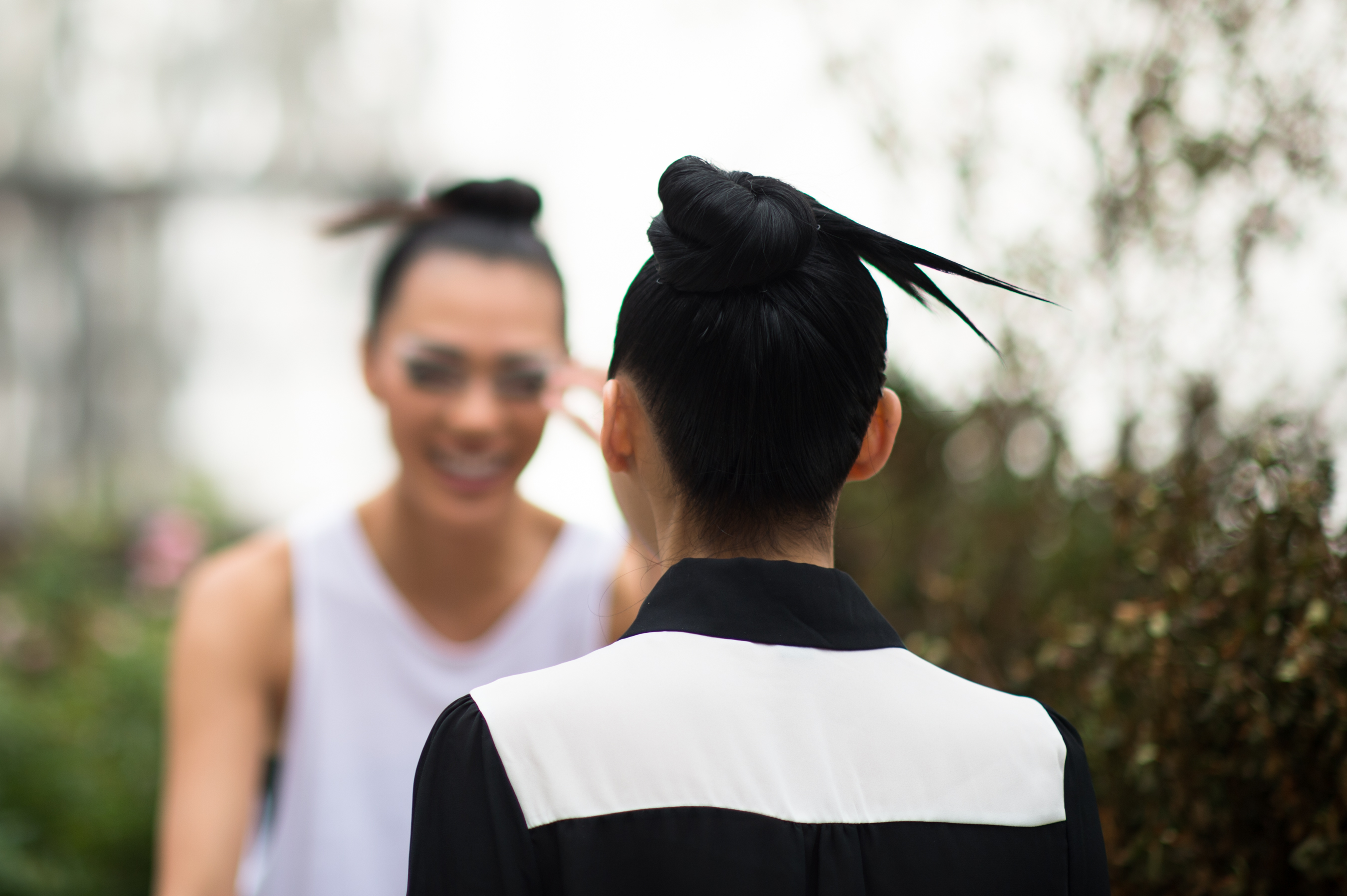Two asian models crazy hair