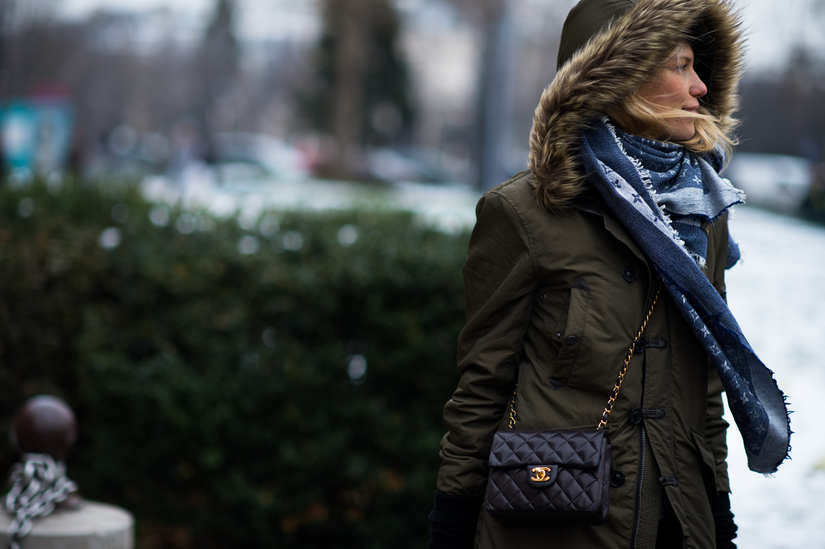 Russian photographer chanel bag army coat
