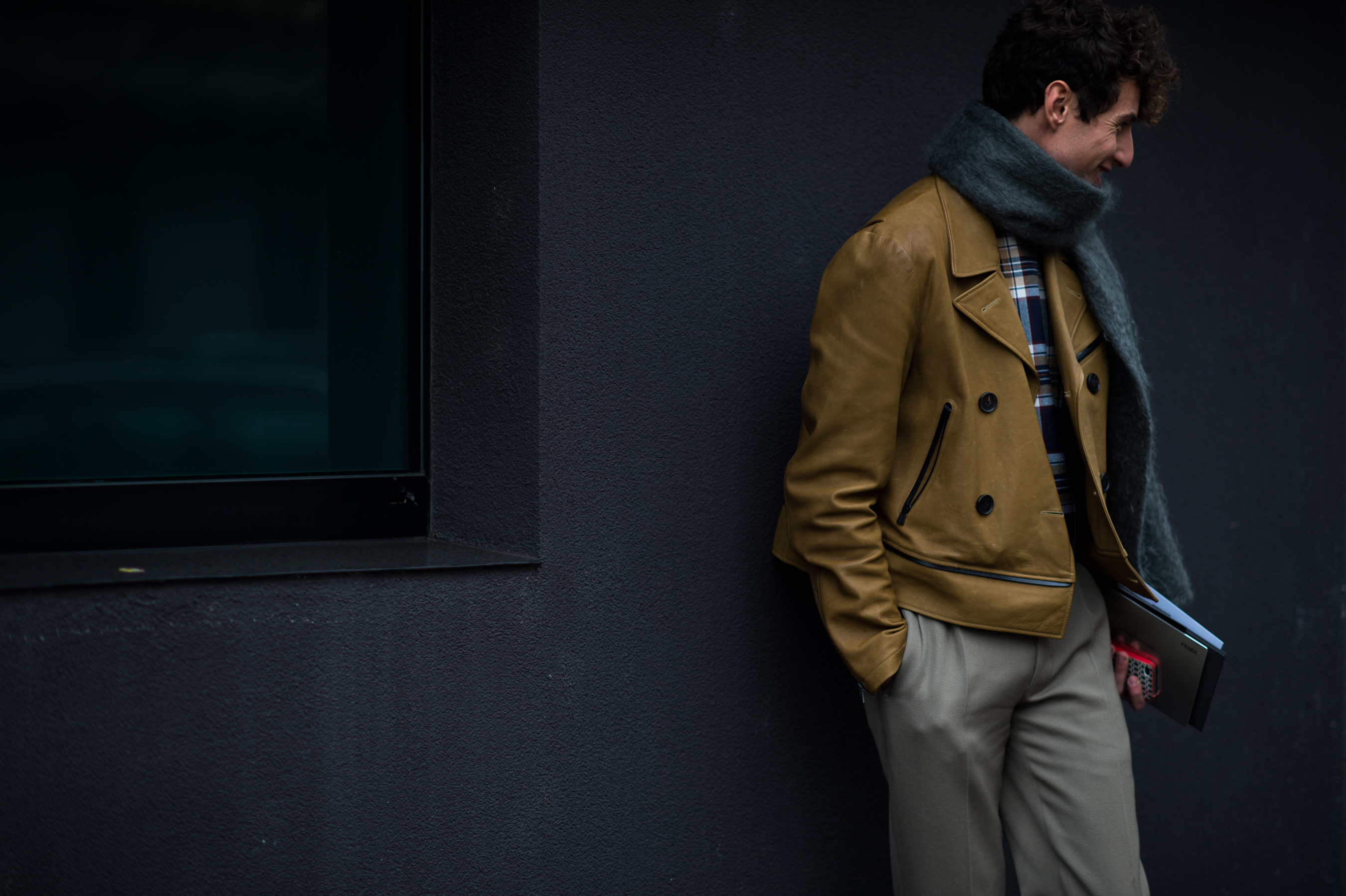 Man wearing mustard leather jacket