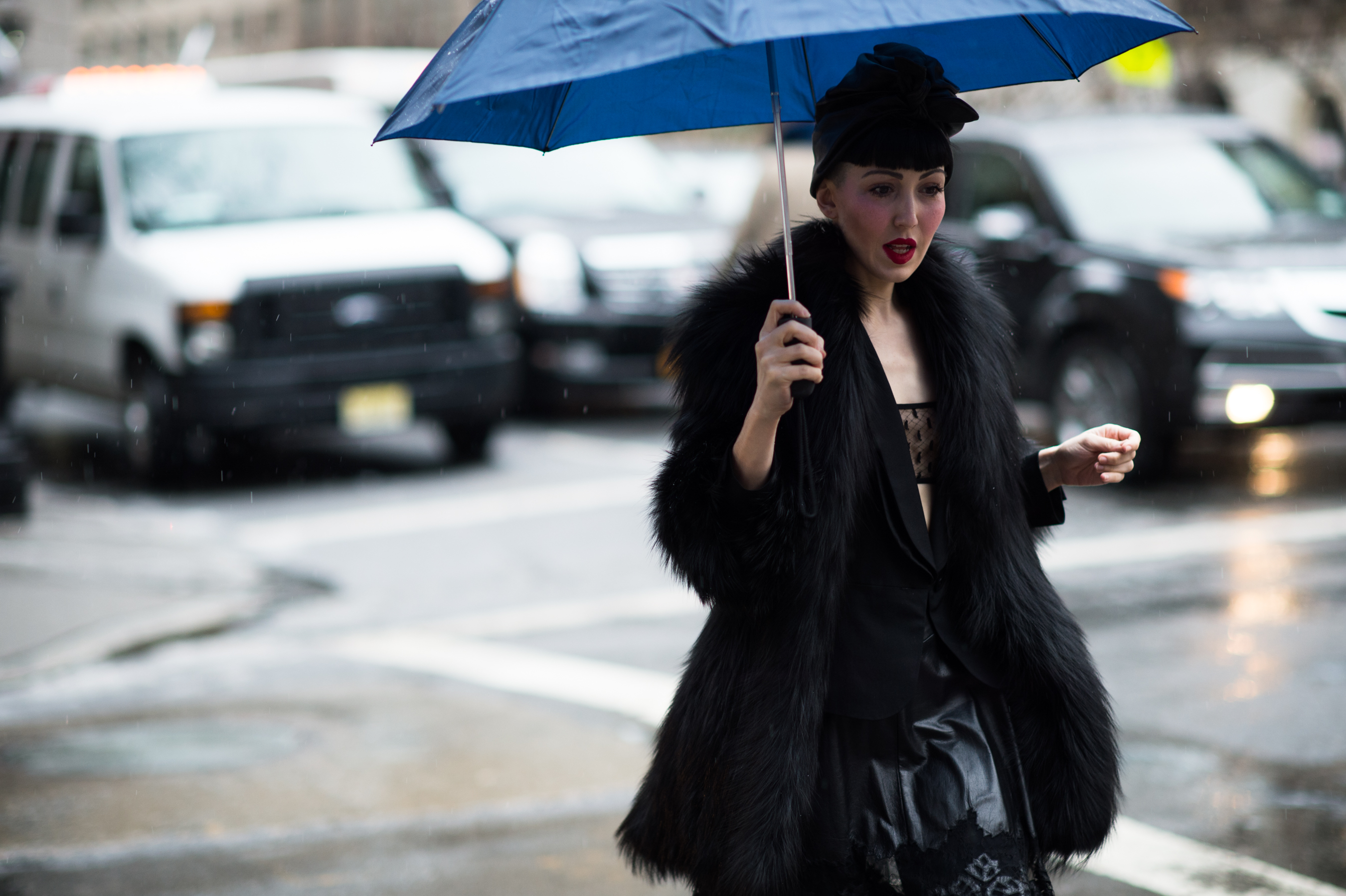 Woman sheer bra umbrella snow