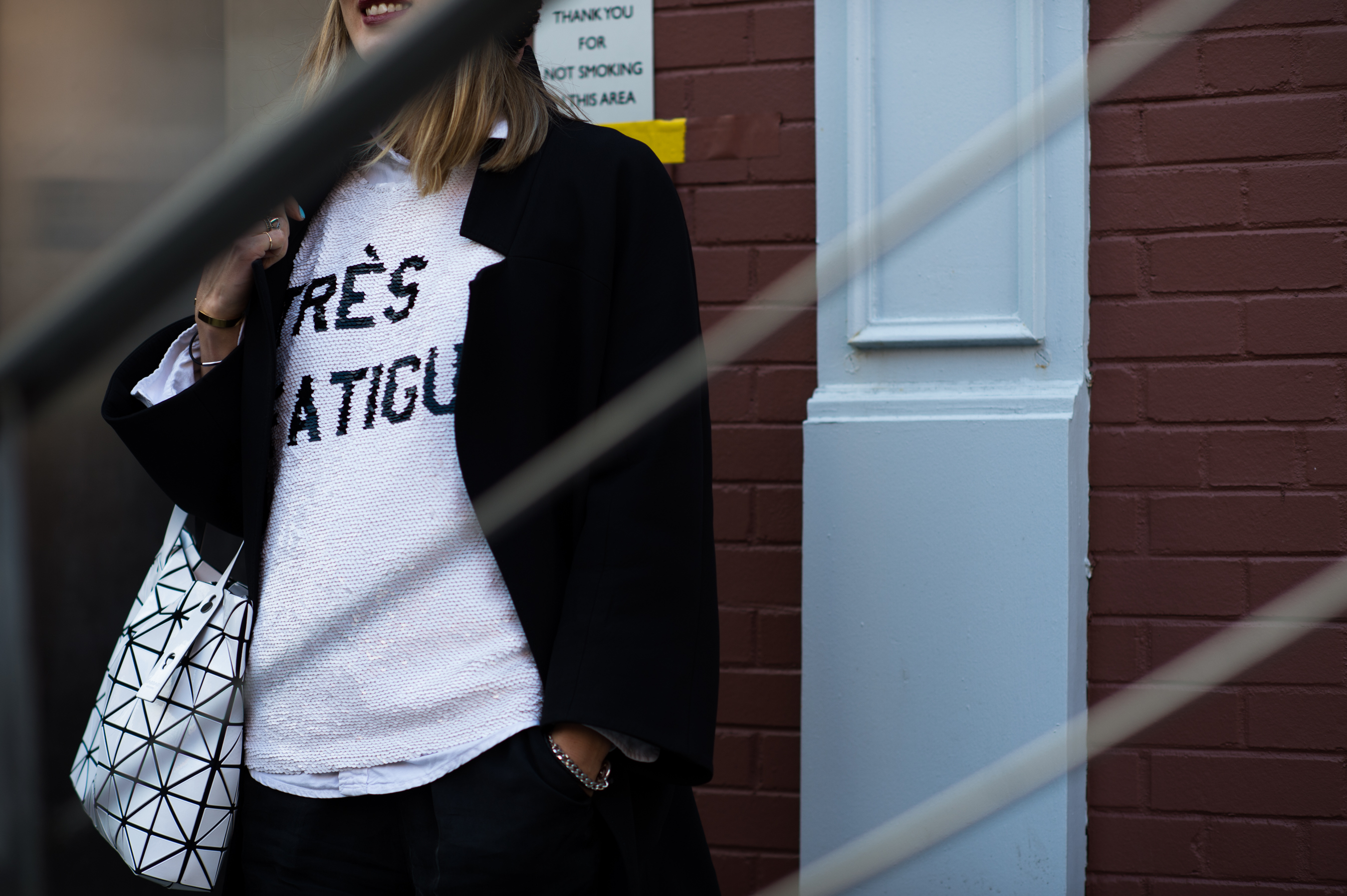 Woman wearing Très Fatigué jumper