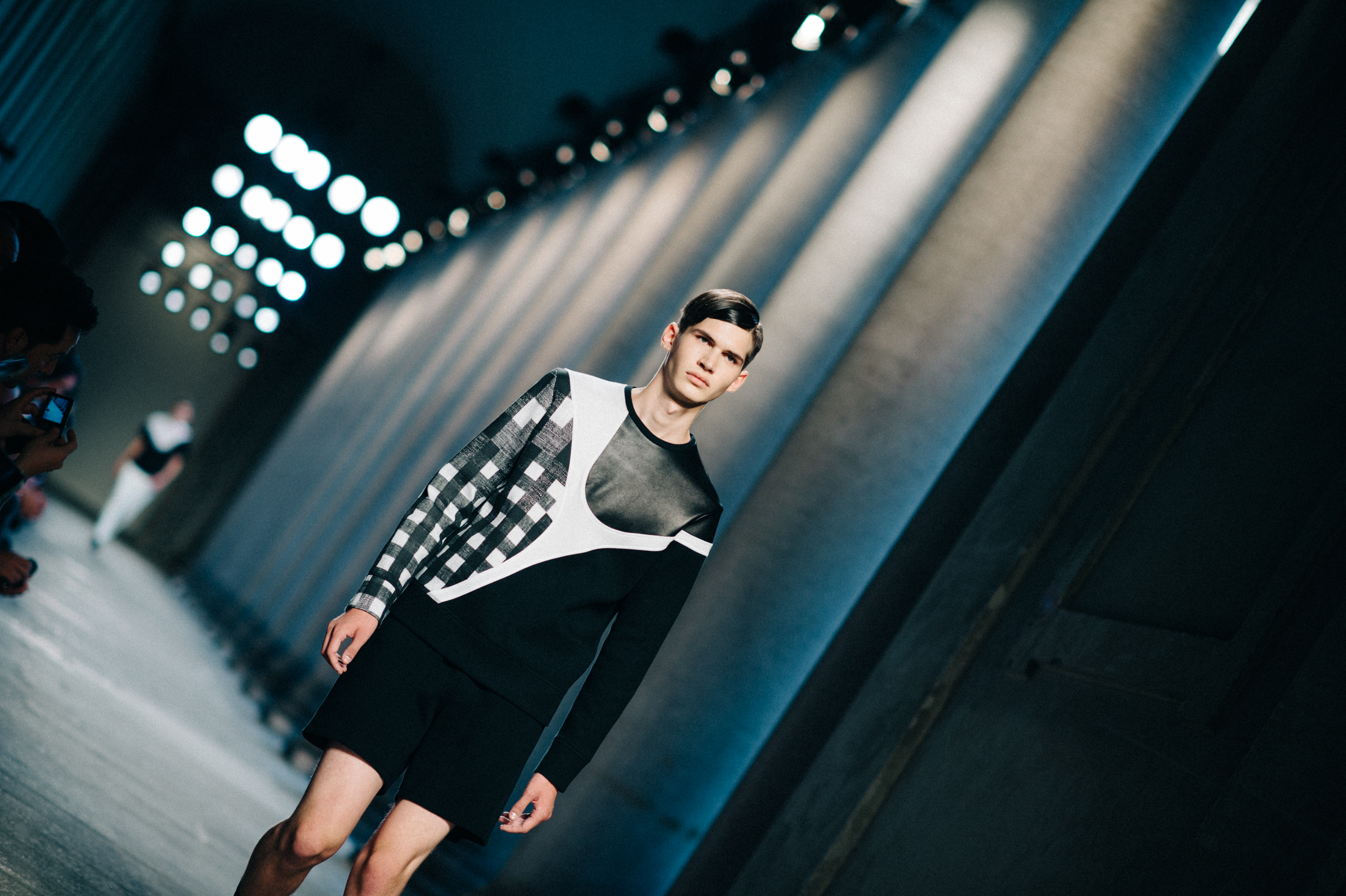 Male model Samuel Roberts on runway