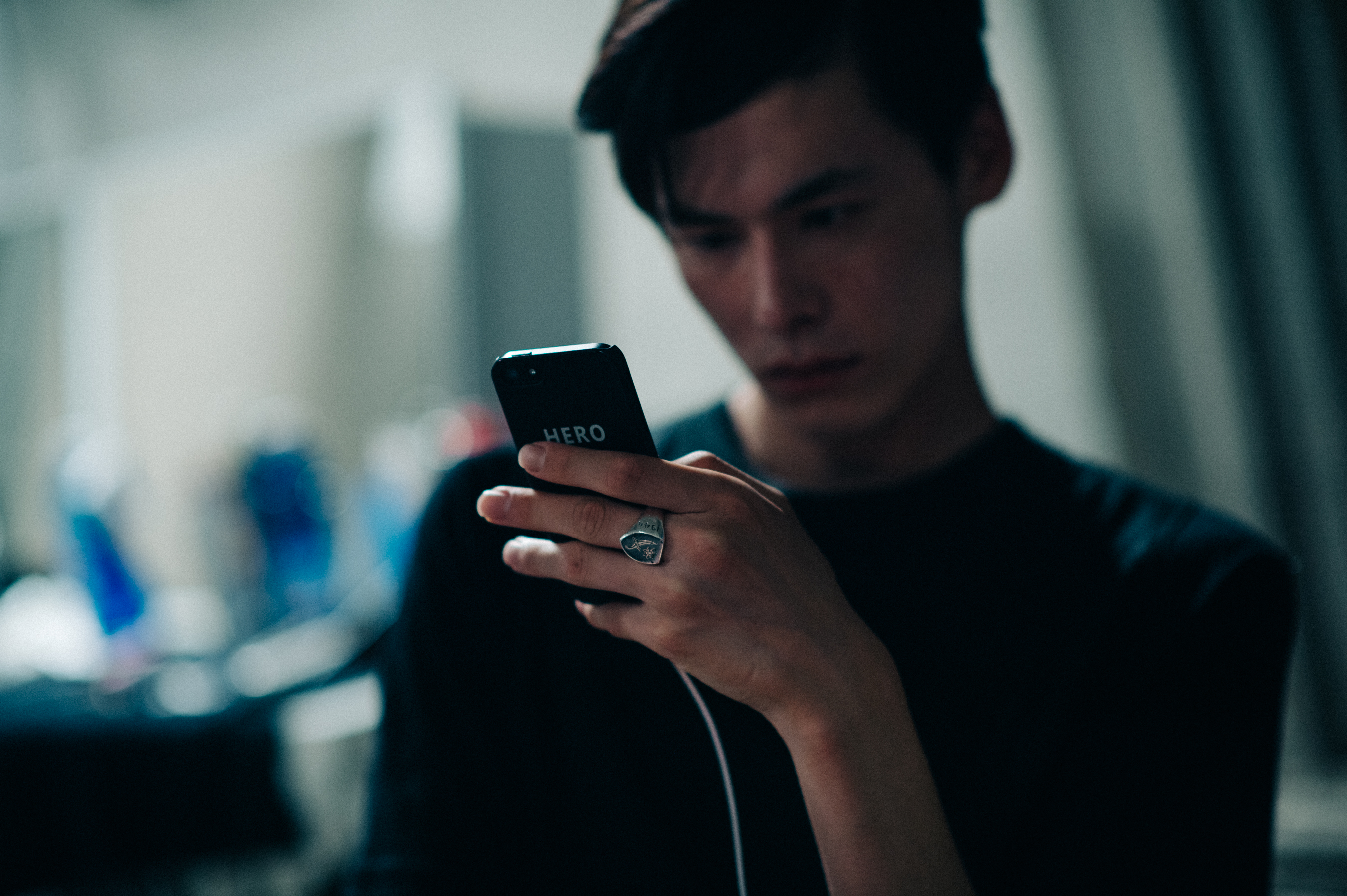 Korean male model WonJung Kim texting