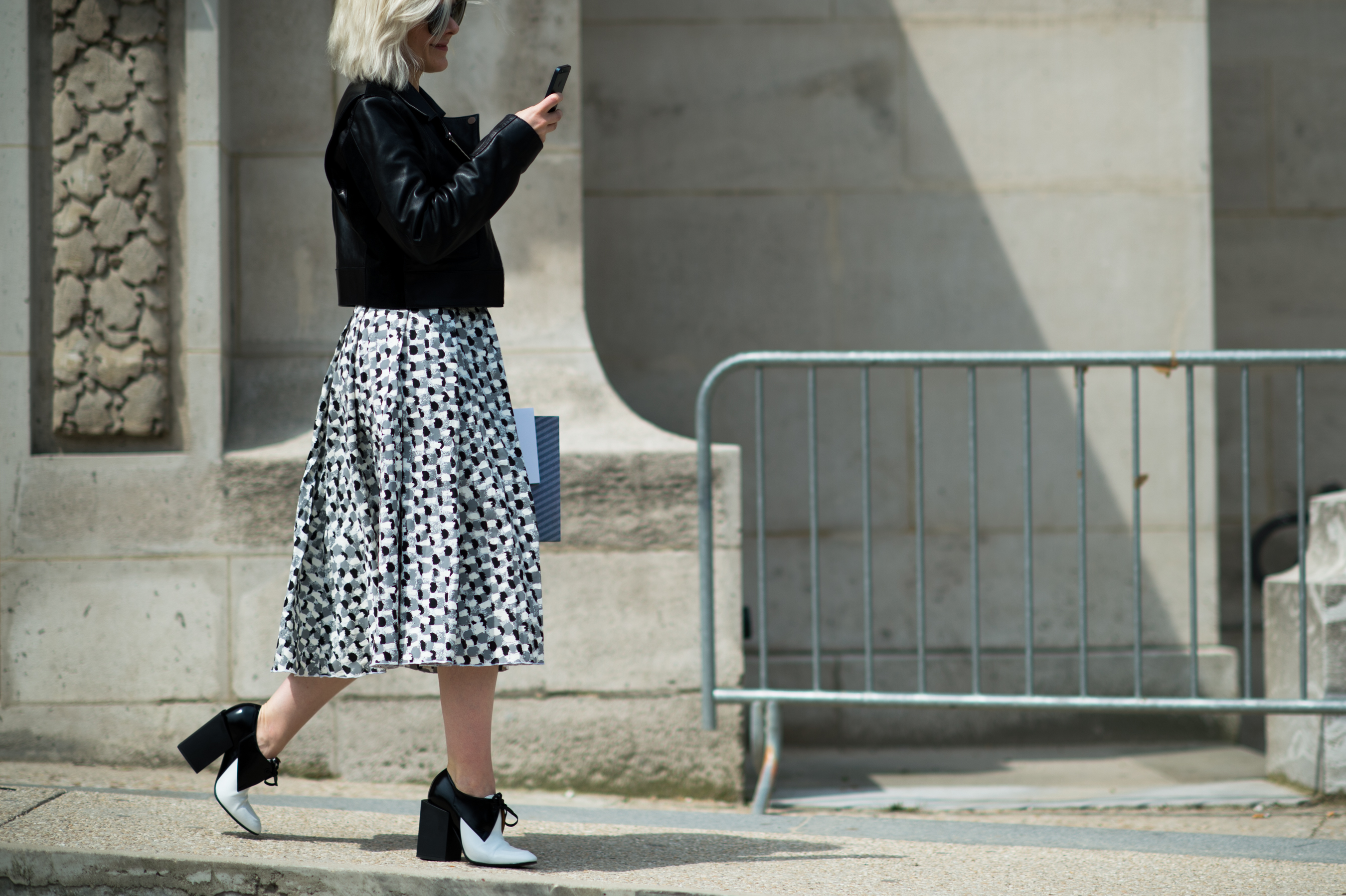 Woman wearing Balenciaga cube heels