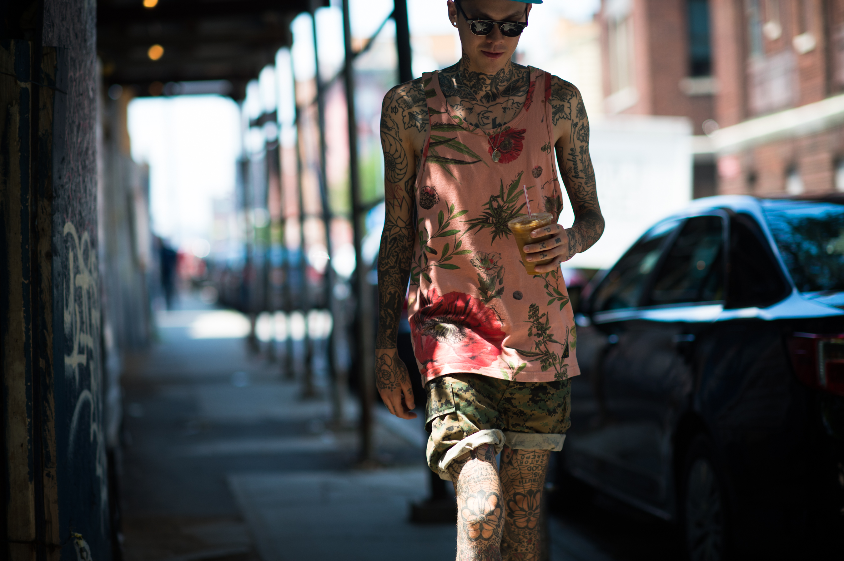 Male model covered in tattoos