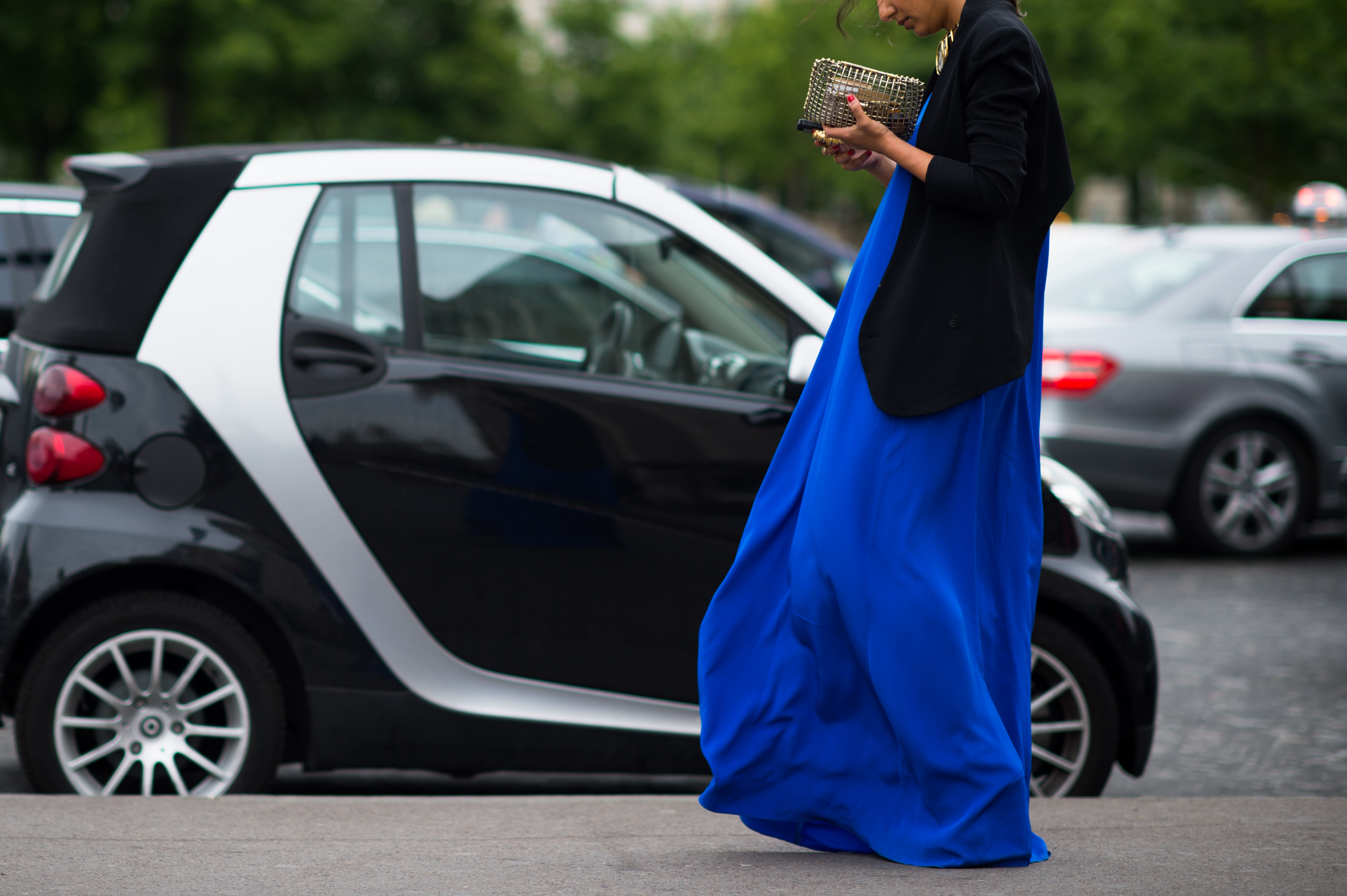 Woman wearing blue silk dress Trocadero