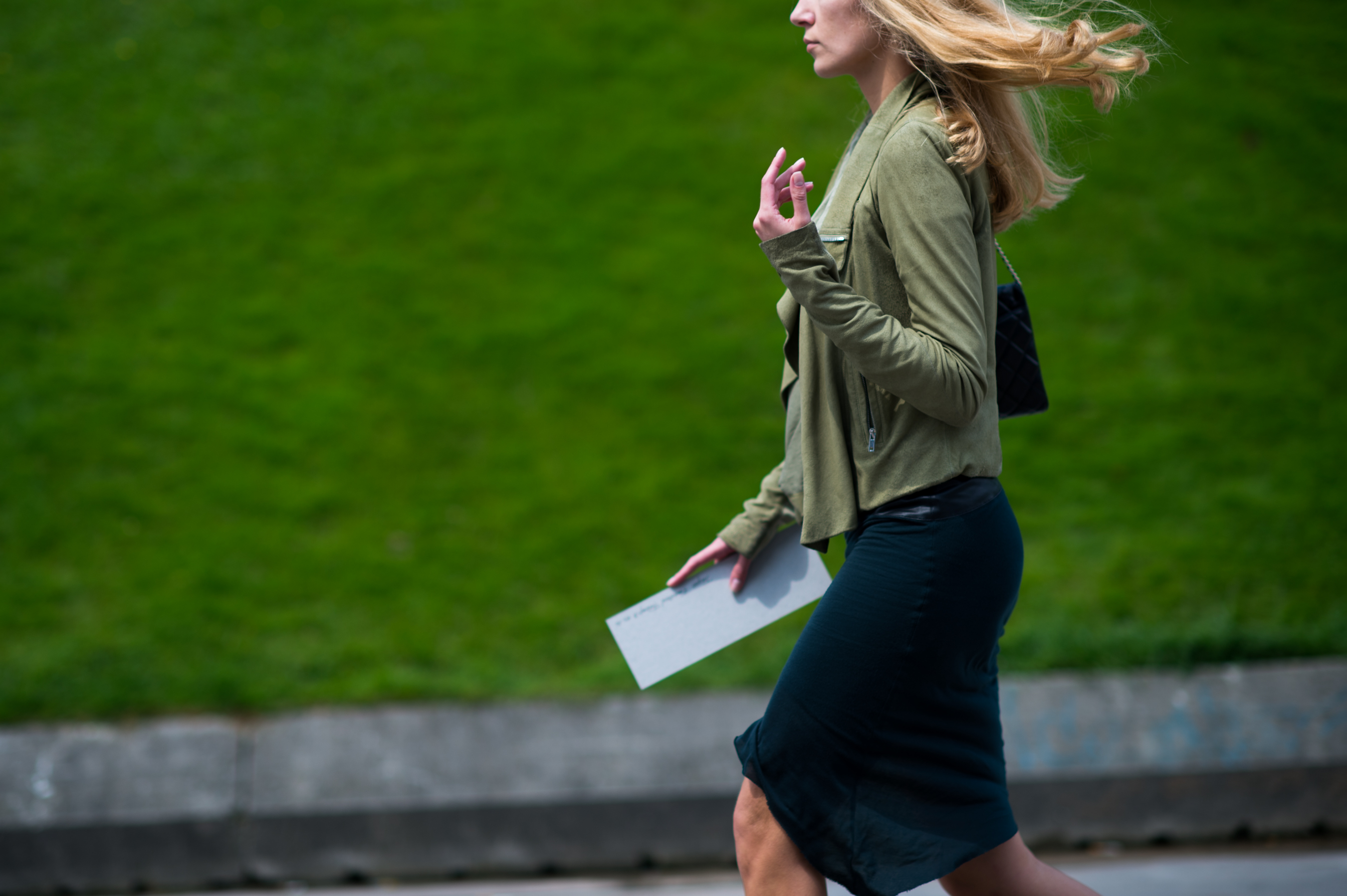 Russian woman blonde hair green grass