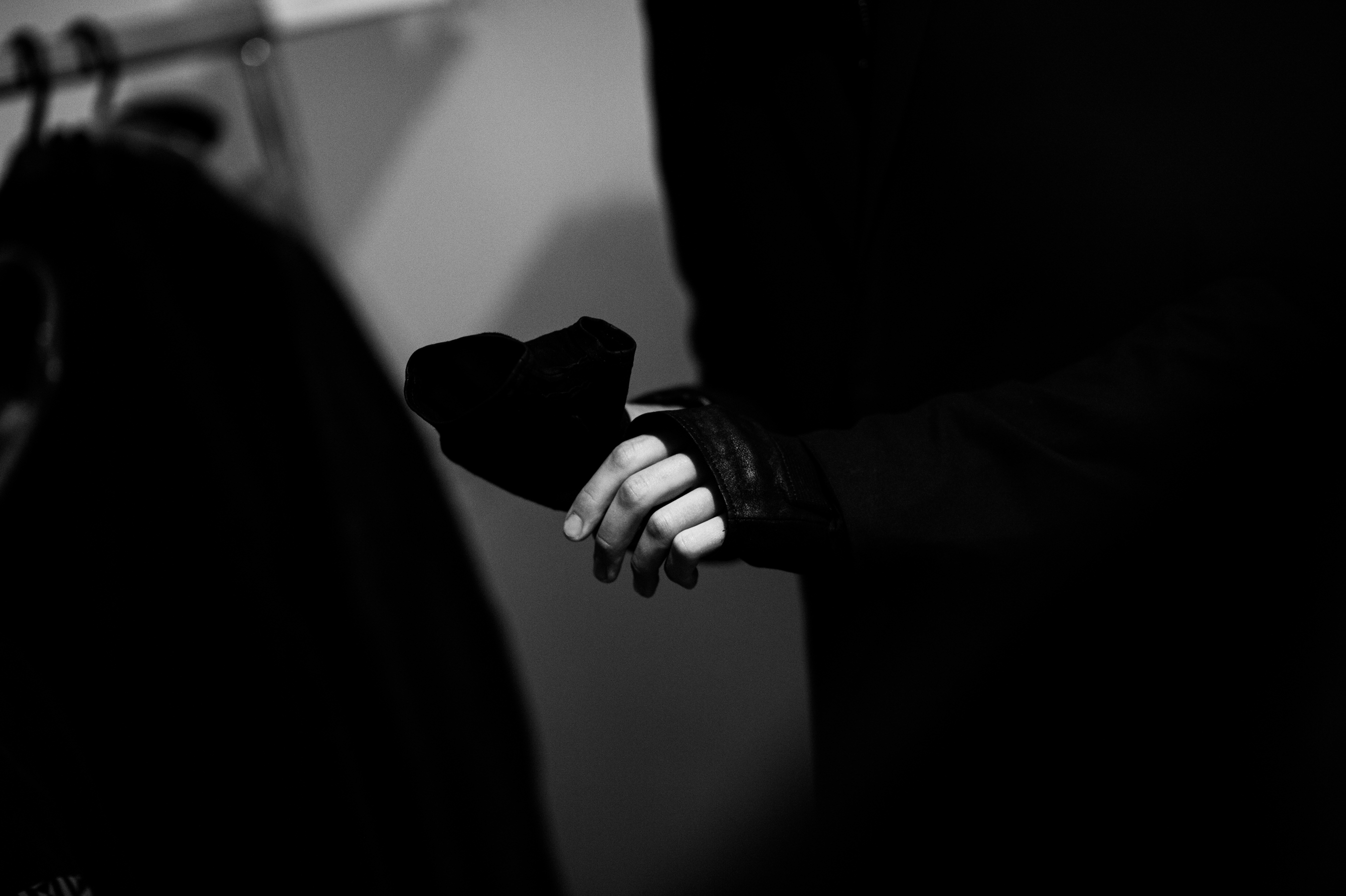 Male model hand black leather