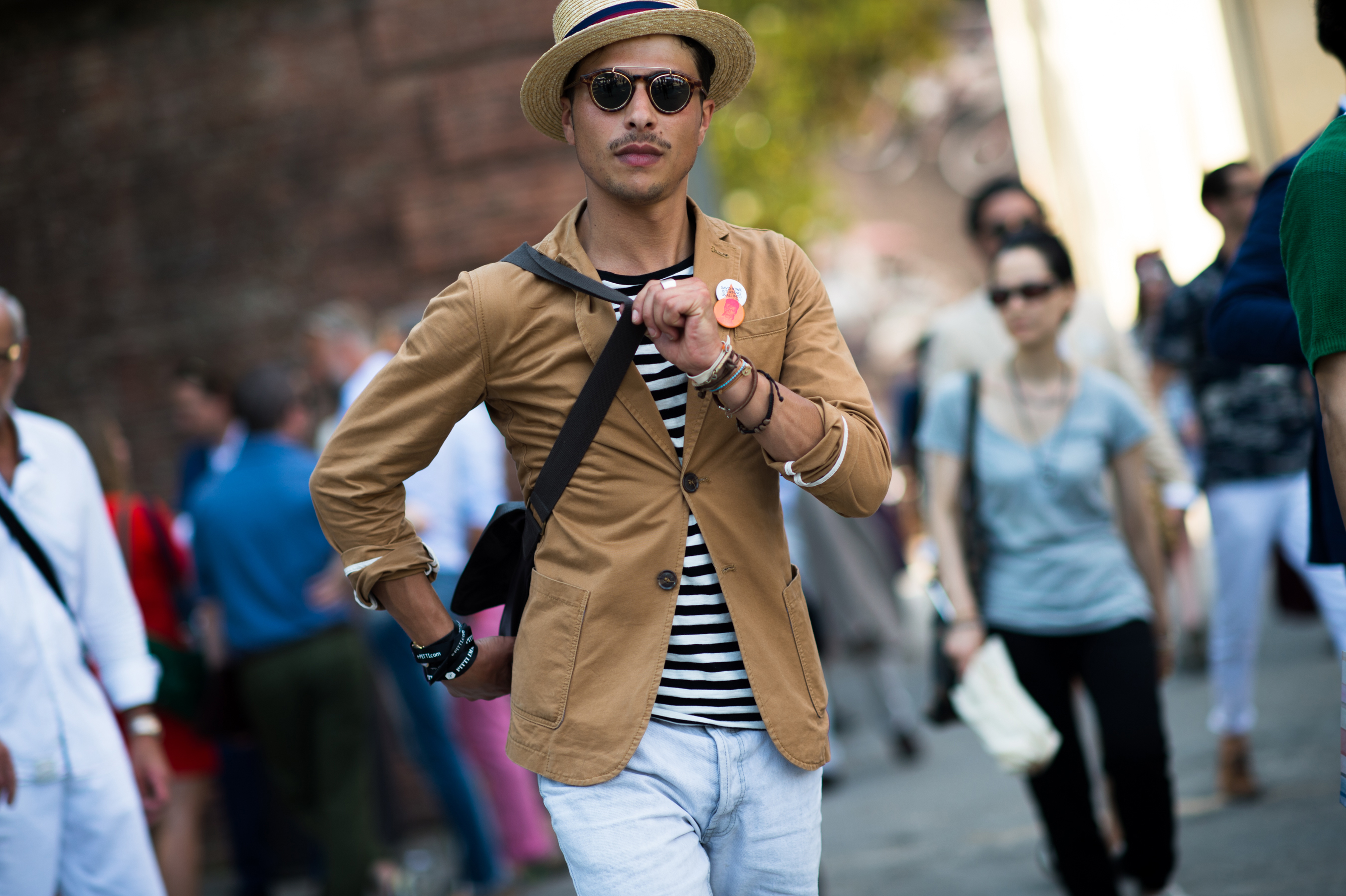 Man wearing tan jacket at Pitti Uomo