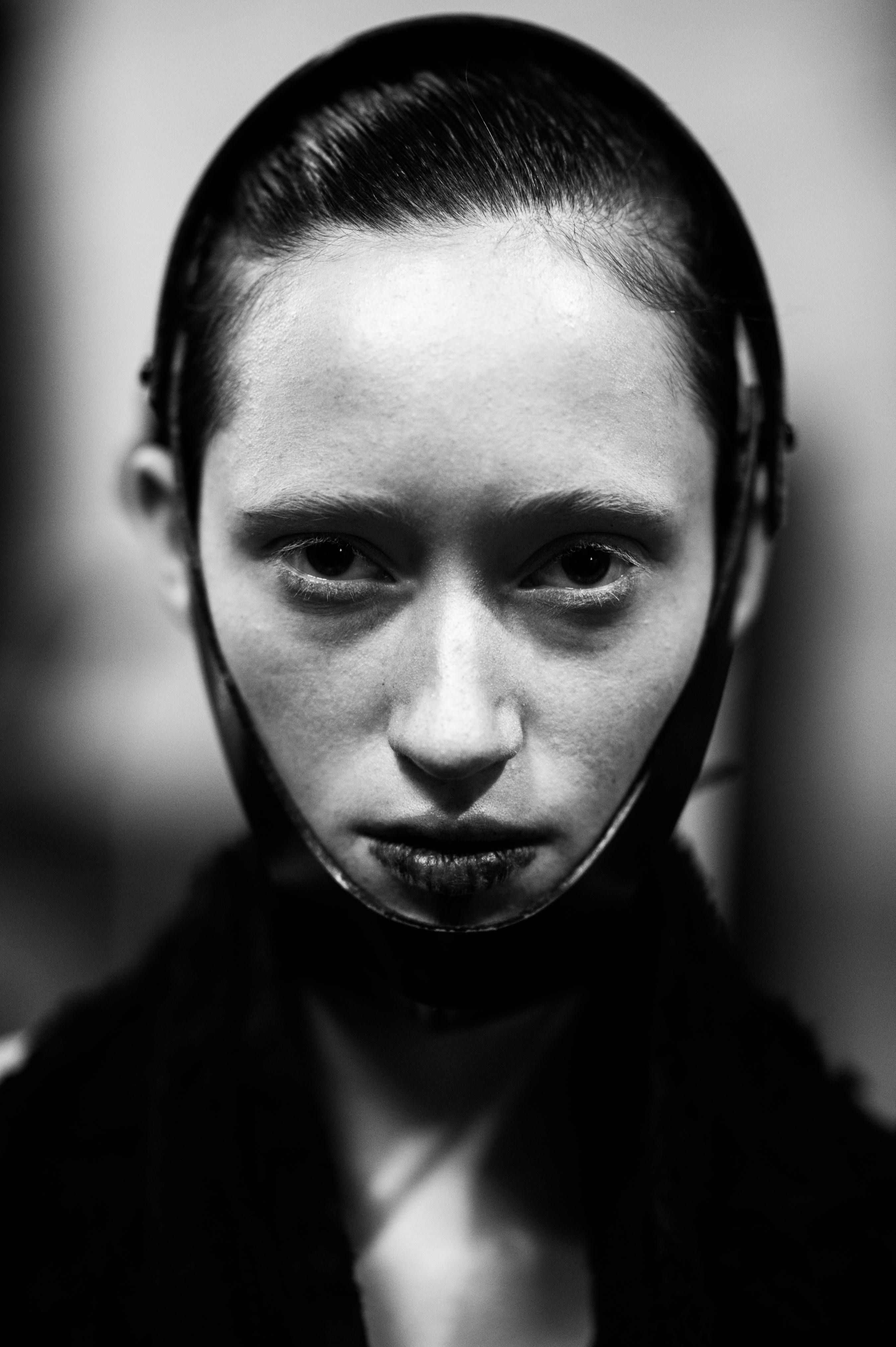 Model wearing leather headpiece portrait