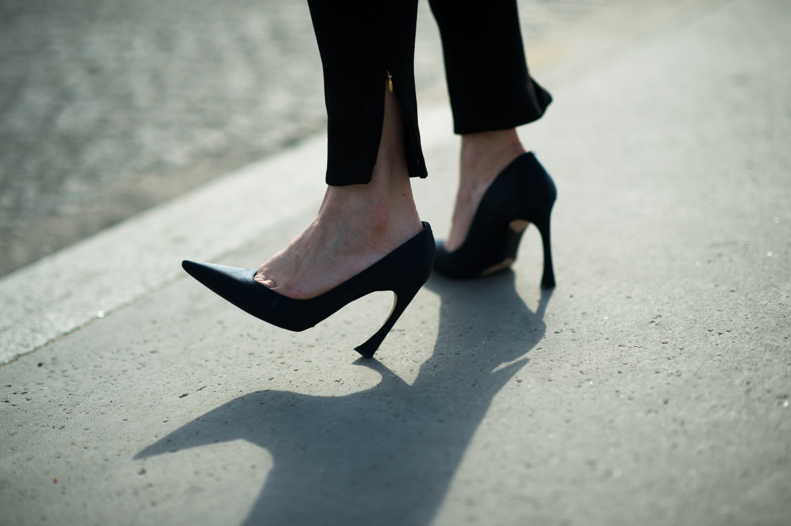 Woman wearing black pump high heels