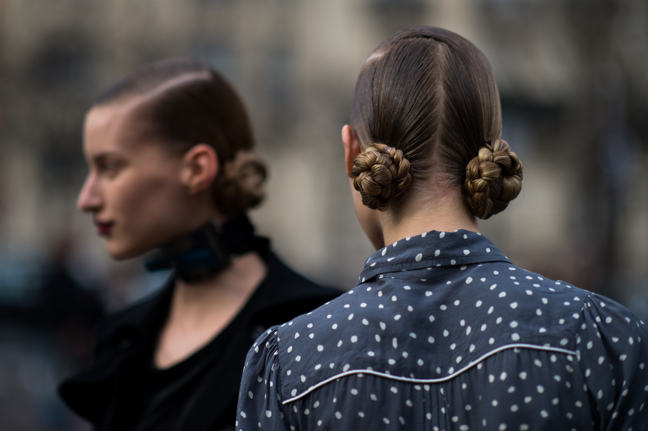 Models in braided buns after show