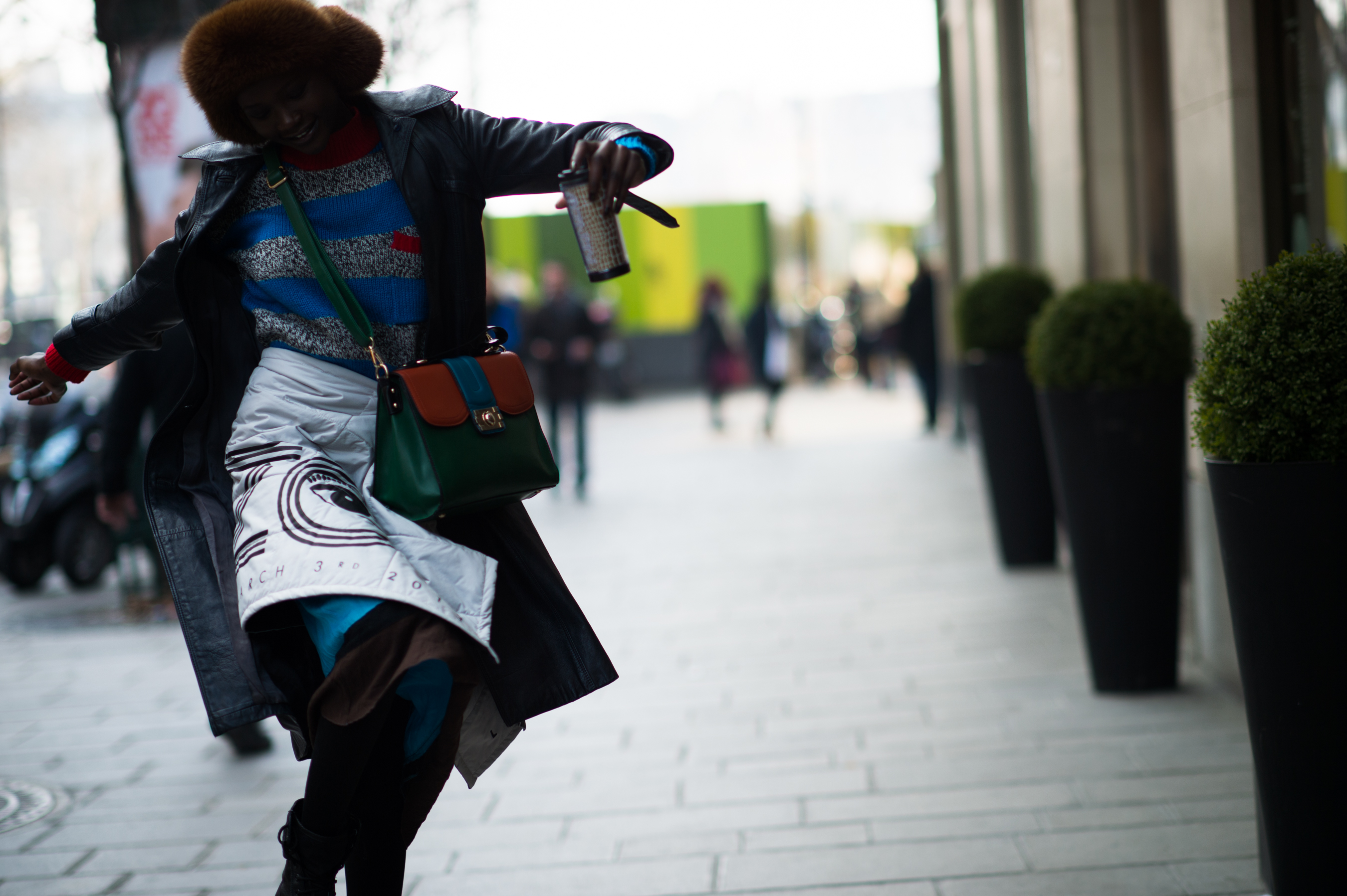 African american model jumping after Kenzo